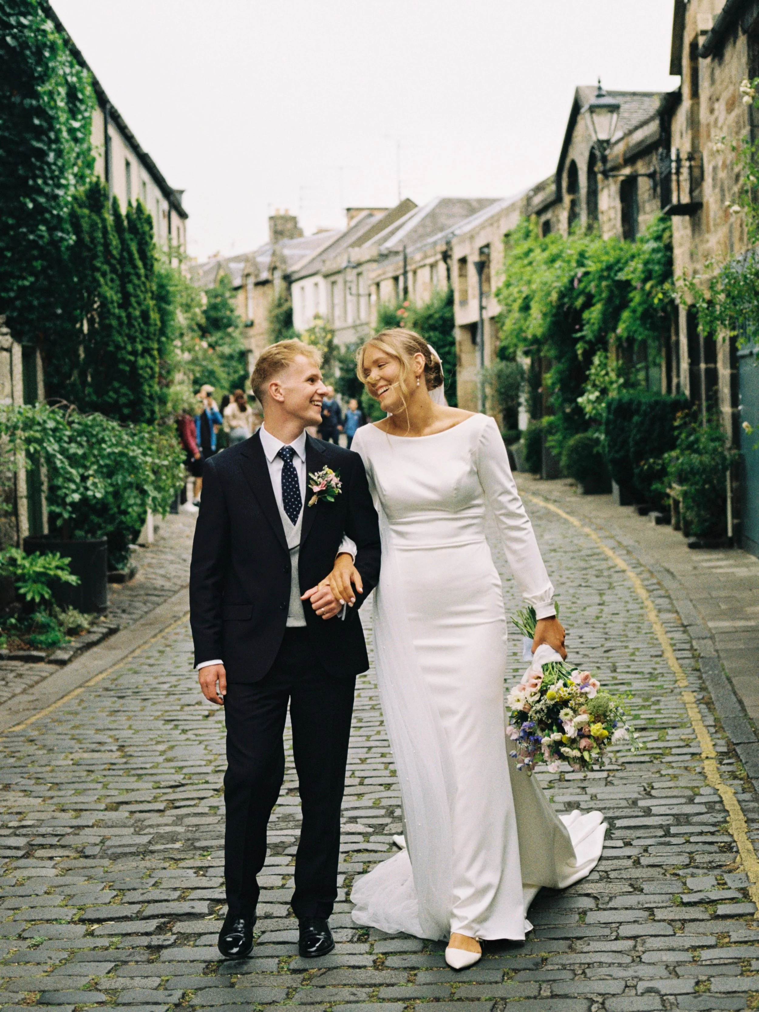 Jen &amp; Caleb on 35mm film. I just love the colours you get from film, the organic and timeless feel which can&rsquo;t be replicated with digital. 

#35mmfilm #kodakgold #circuslane #caltonhill #edinburghwedding