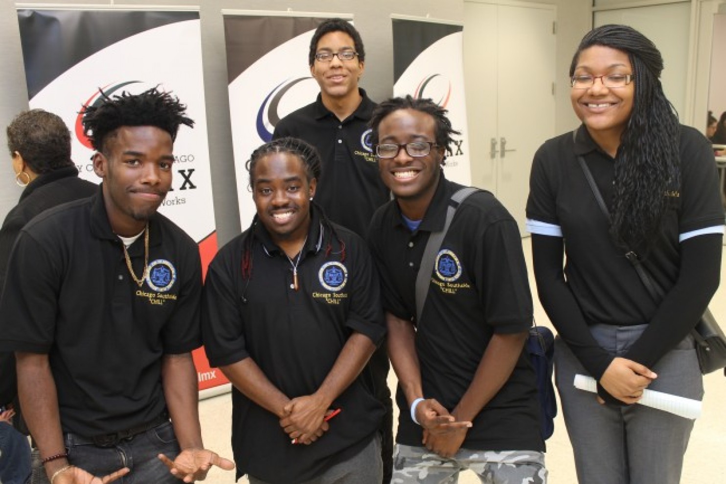 The CHILL trainers (left to right): D’Atrey Brinson, Devin Swift-Bailey, Judge Moore, Jonathan Jackson, and Janea Moore at the Get in the Game Teen Summit on Nov. 18 at Malcolm X College in Chicago. (Photo credit: Philip G. Tarver)