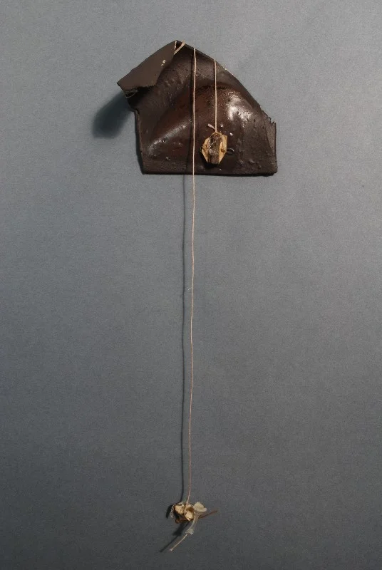 Untitled, 2012-13. Clay, with found materials, 11” x 3” x 3”