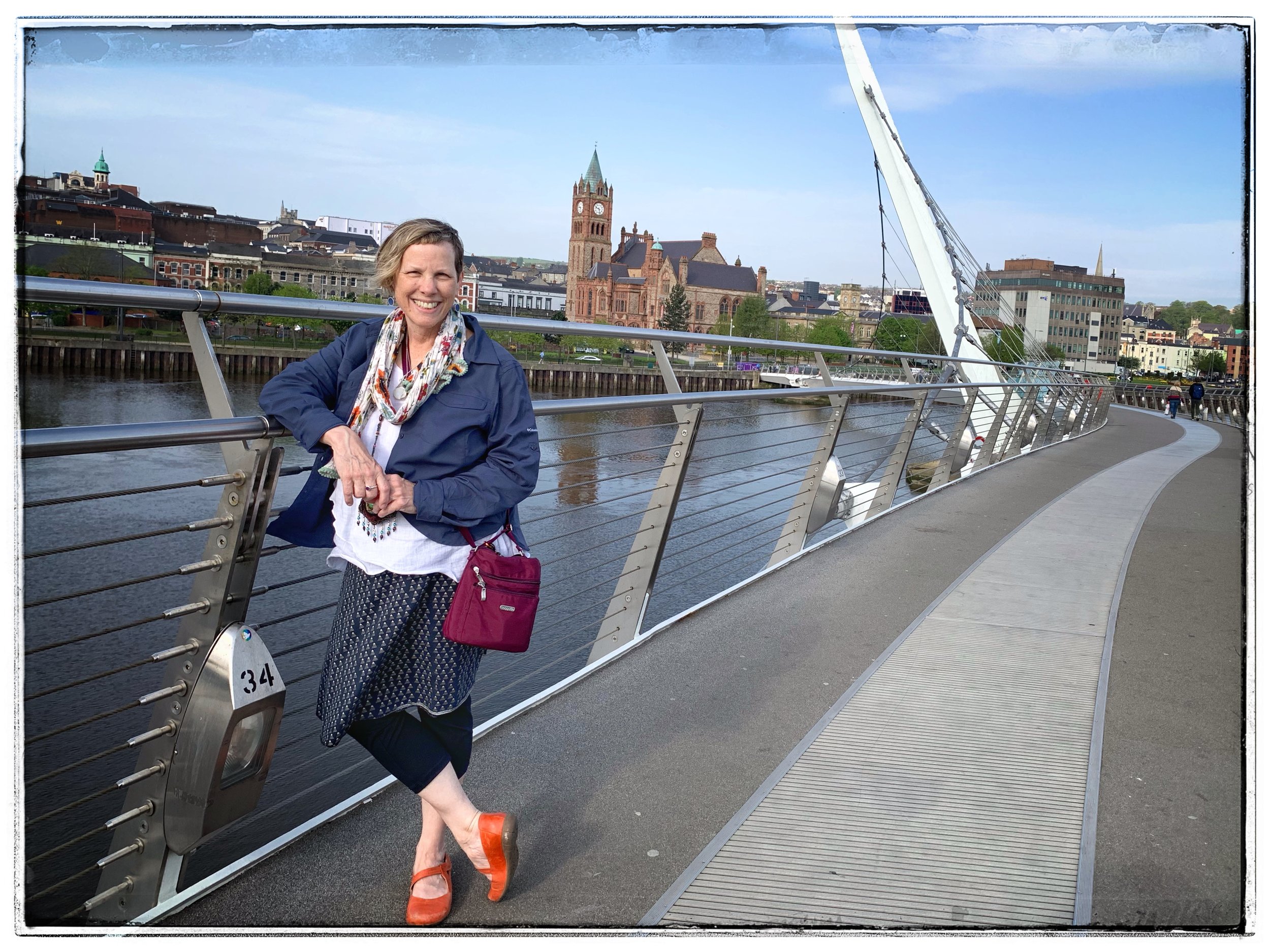 Crossing the Peace Bridge on a beautiful first day in Derry. Many famous people have walked across this bridge as well as everyday folk. It is a powerful symbol of healing. photo by Lauren Richardson.