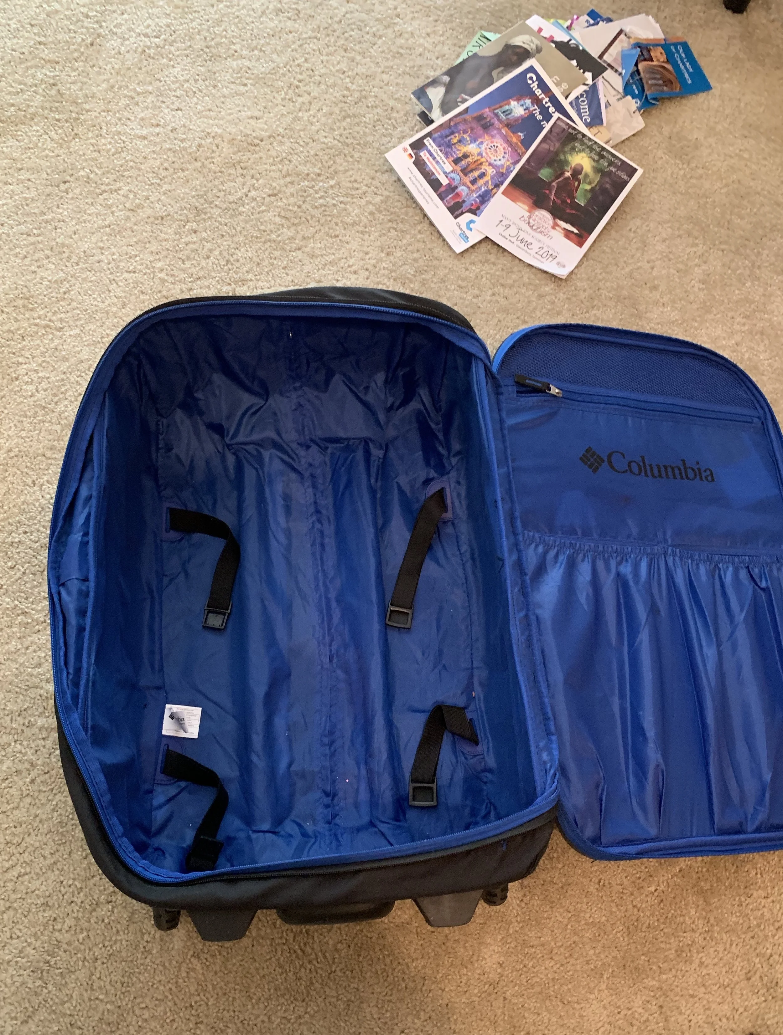 It took a few days to empty the suitcase, but there are still stacks of receipts, papers, and gifts scattered throughout my home. photo by anne richardson