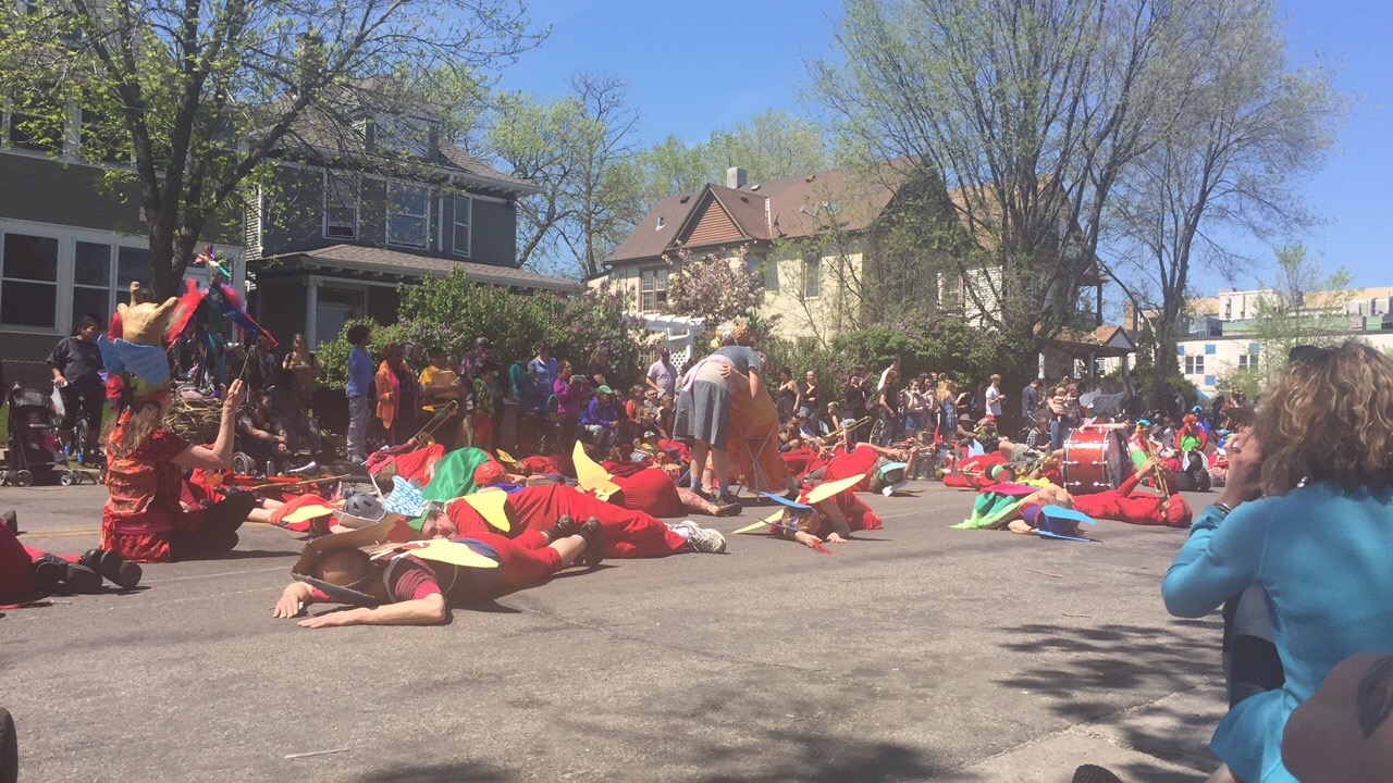 They had a dance and about thirty people lay down on the ground....gross...right on the street with their bare faces. 