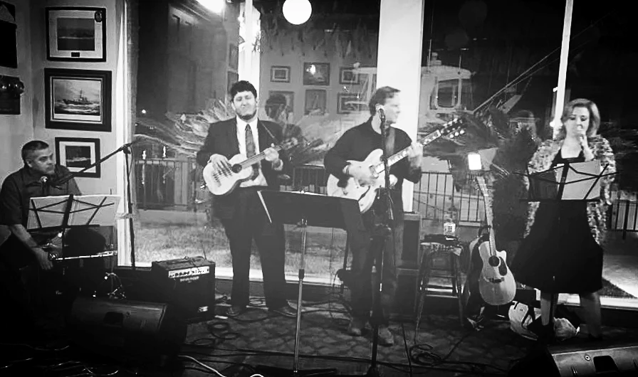 Thousand Eyes was formed in 2010 as an instrumental jazz quartet by students from San Diego City College. This latest incarnation features Salli Martin on lead vocals, Dave Trickey on guitar and vocals, Roy Robinson on percussion and vocals, and Ricardo Roblado on bass. The band covers jazz standards, jazz/pop hits and classic rock tunes. Follow them on facebook.com/thousandeyesmusic .