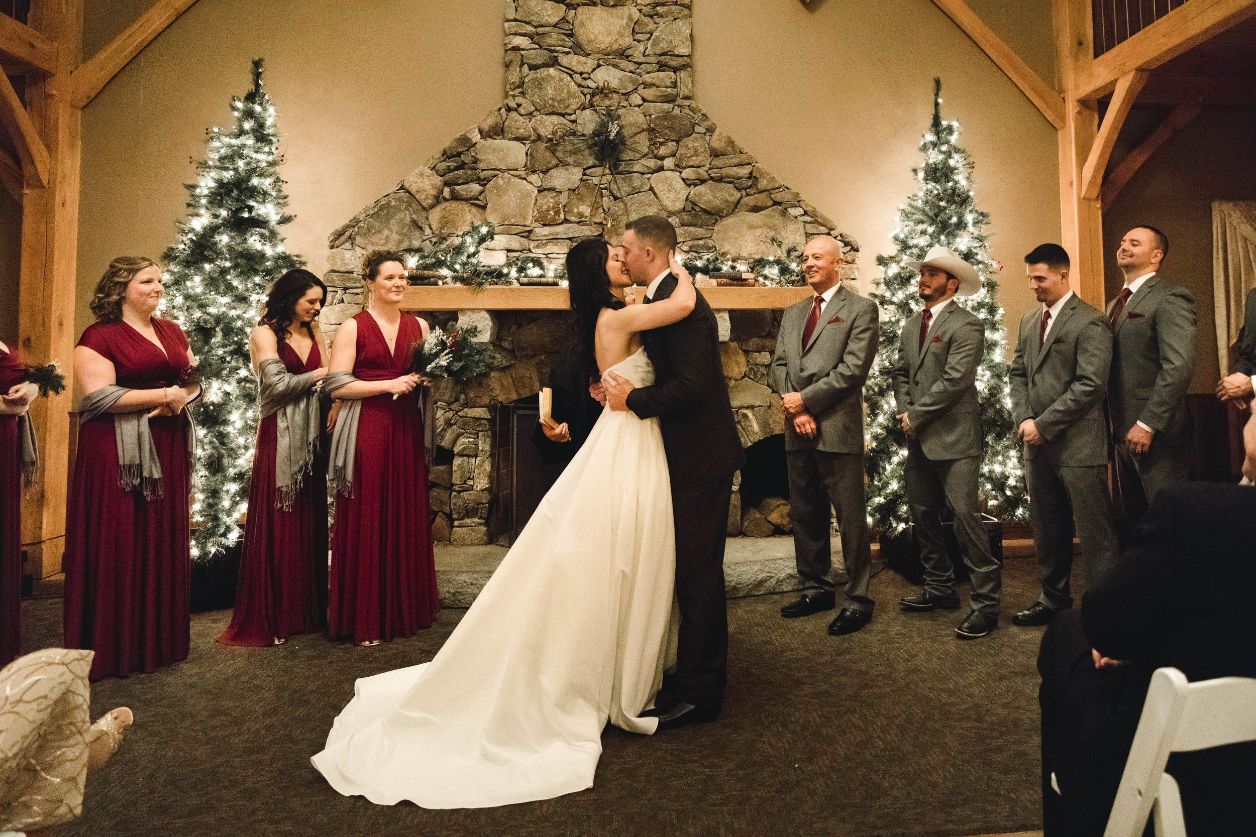 first kiss at Harrington farm winter wedding