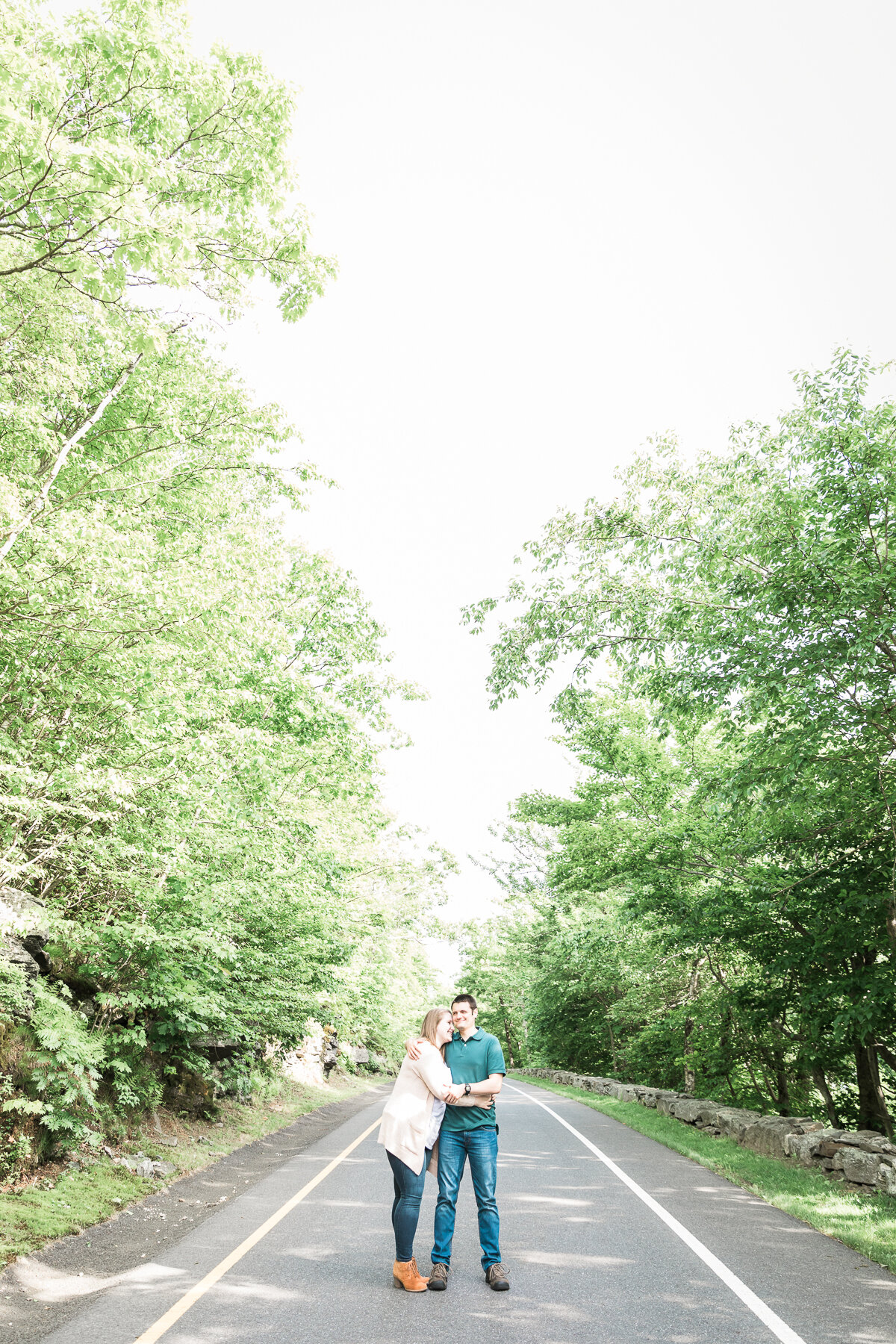 Casual Engagement Photos on wooded road
