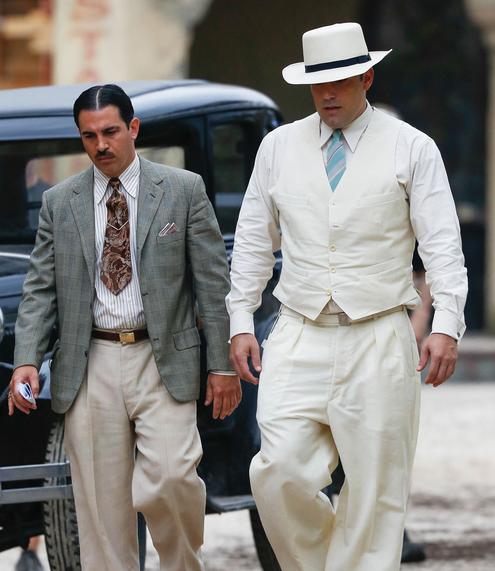 Chris Messina (left) and Affleck are thick as thieves in the movie and avoid a lot of the major gangster tropes with their character dynamic. 
