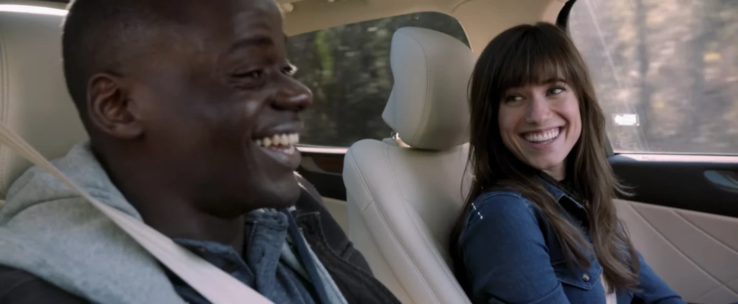 Chris (Daniel Kaluuya) and his girlfriend Rose (Allison Williams) are on their way to stay with her family for the weekend. This might be the happiest his character is in the whole movie and it's about five minutes in. 