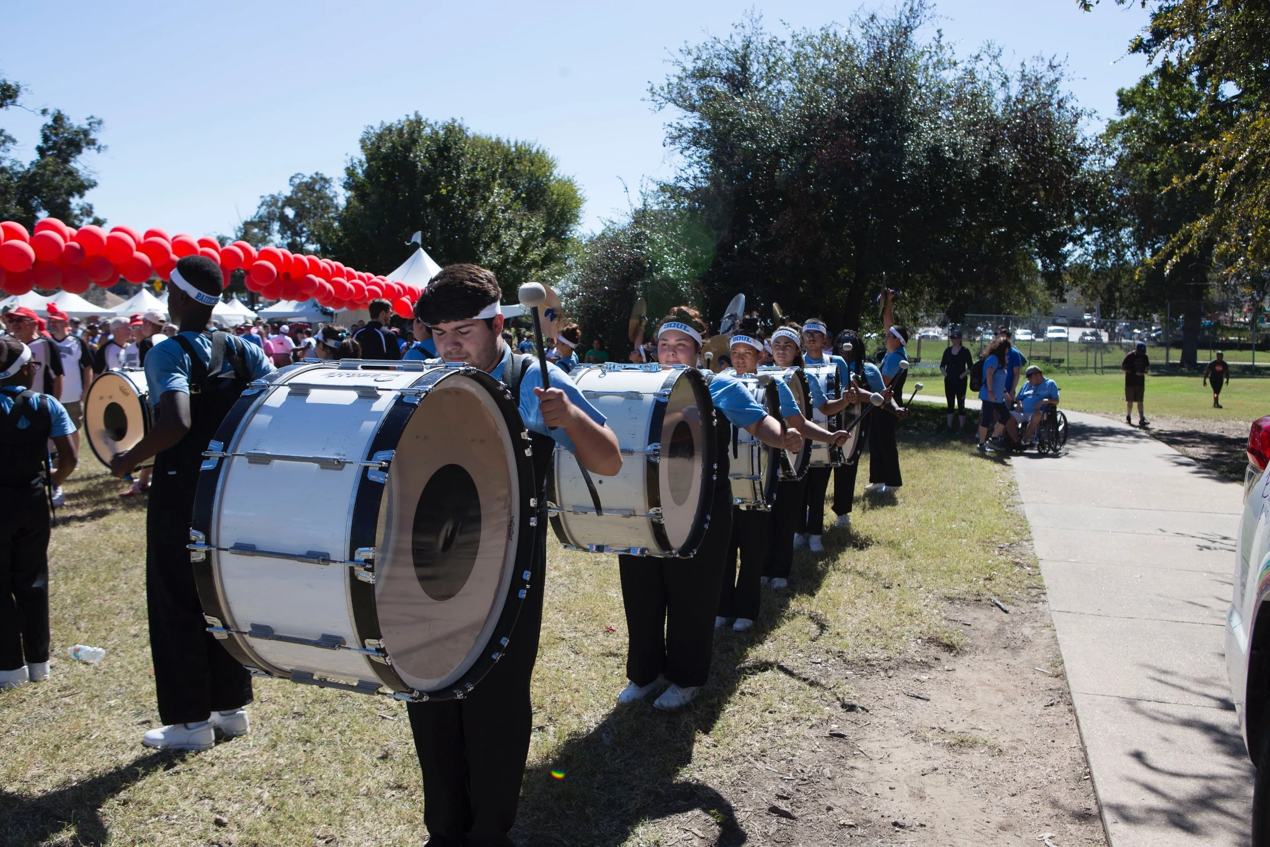 All participating organizations line up for the start of the AIDS Walk Austin as the performing SOUL Band, whose drum line officially launches the walk, get in formation.