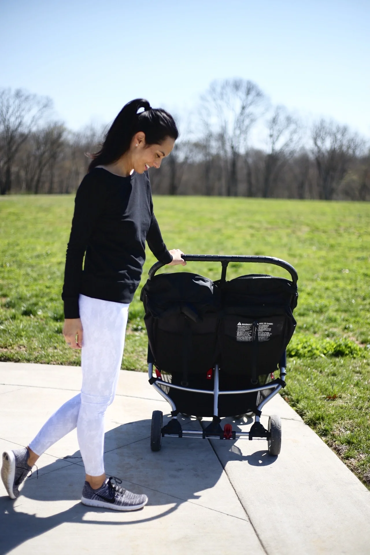 | Alo leggings | Nike sneakers | Zella top similar | double stroller | image: Sydney Clawson | 