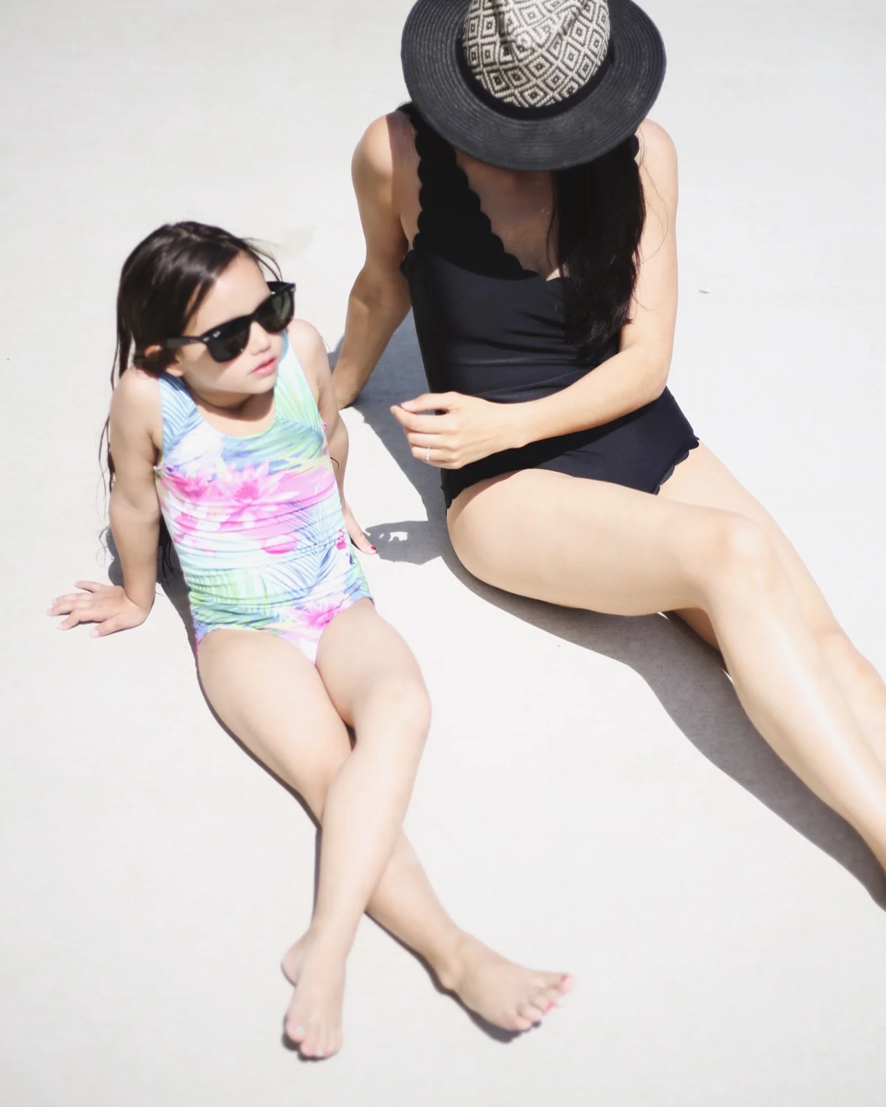 | girl swimsuit similar | girl sunnies | scalloped one piece | hat similar | image: Sydney Clawson |&nbsp;