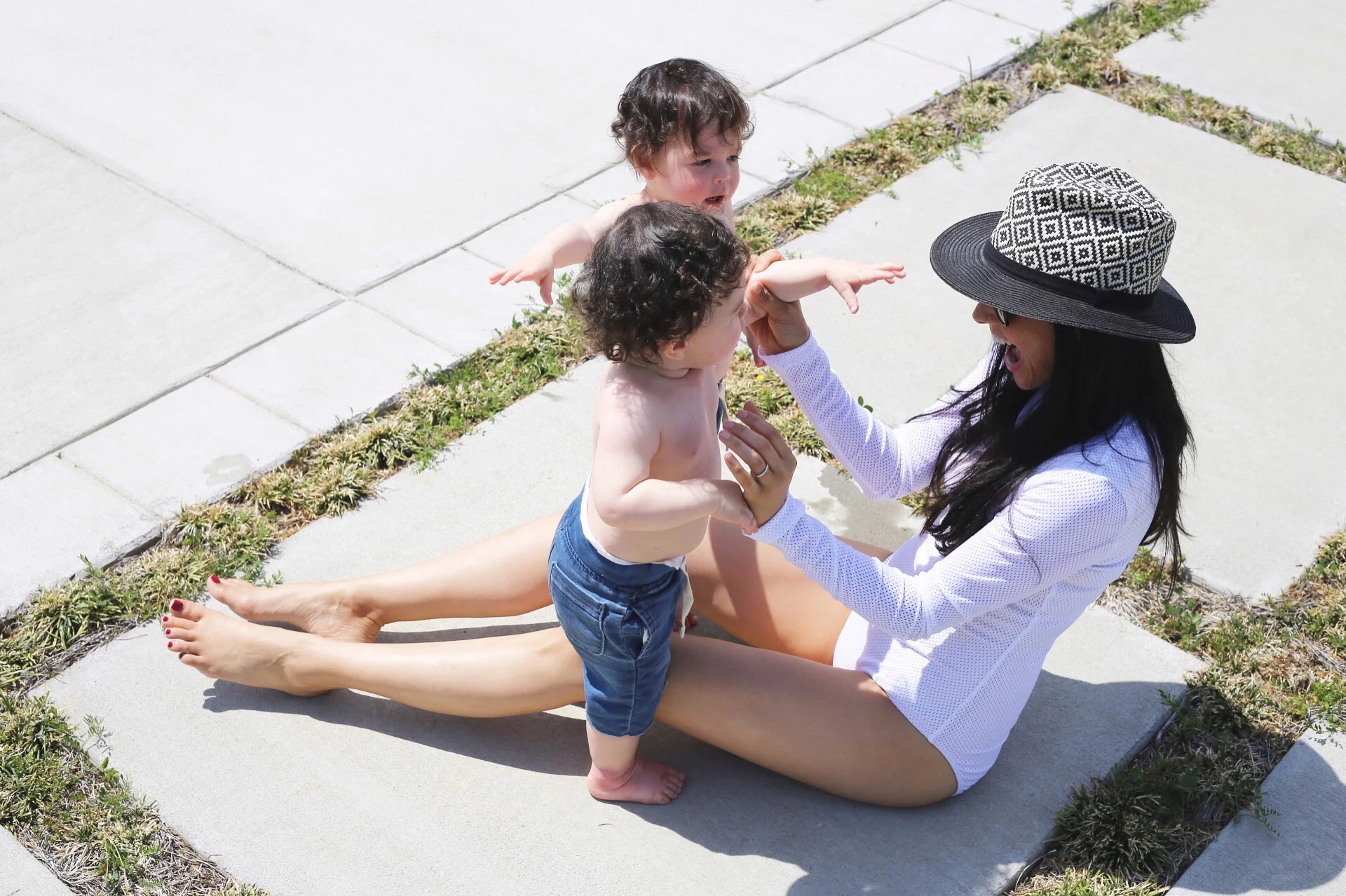 Coverswim one piece | sunnies similar | hat similar | toddler shorts &nbsp;| image: sydney clawson |