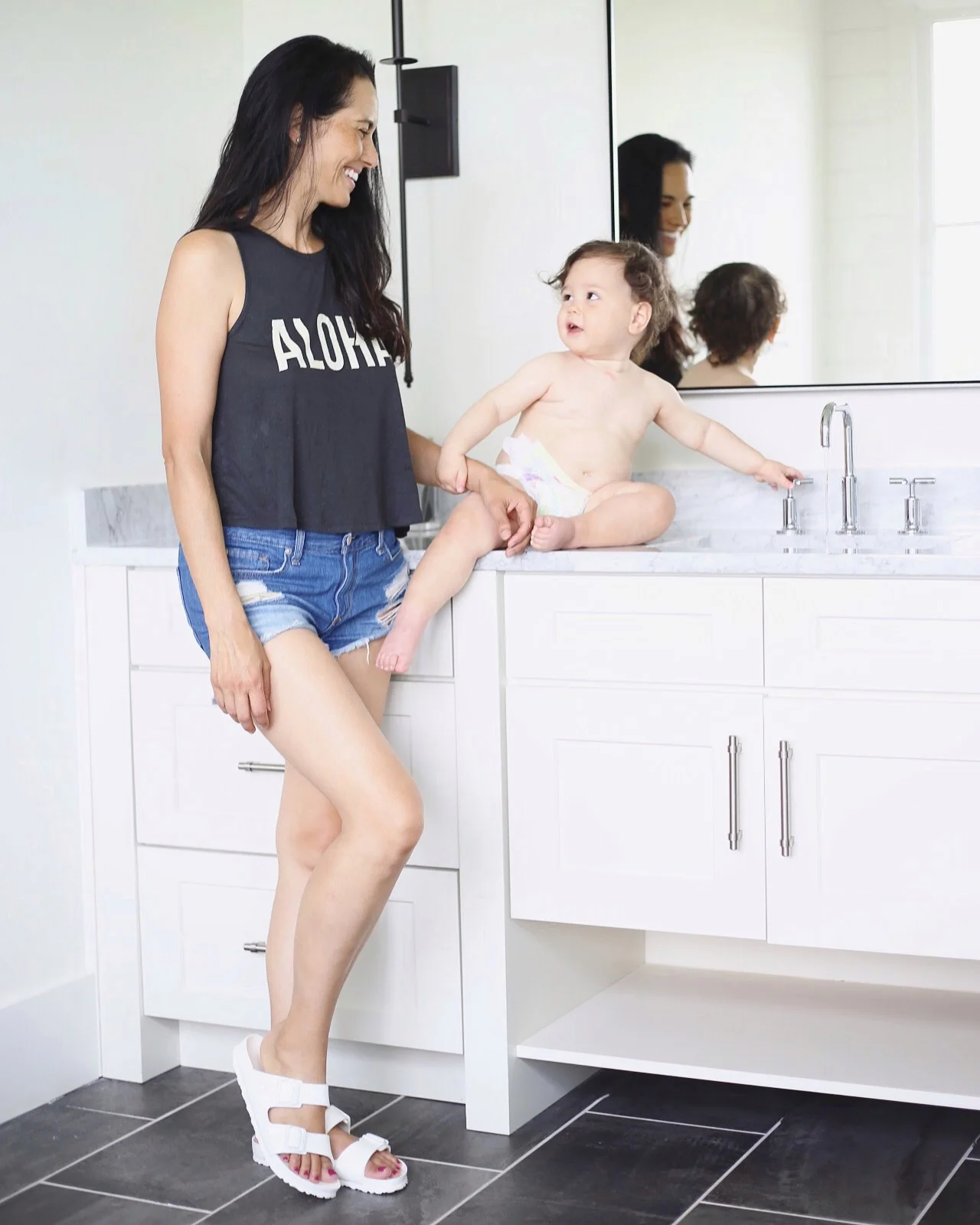 | cutoffs | aloha tank | birkenstocks (waterproof and under $40!) | image by sydney clawson | 