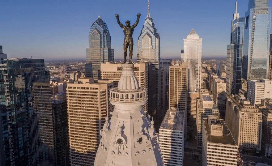 PHILLY UNVEILS 4th ROCKY STATUE

As devoted urbanists, SITIO has proudly assisted in crowning a new champ atop City Hall: Philadelphia&rsquo;s fourth Rocky statue, now standing where William Penn once quietly minded his business and occasionally curs