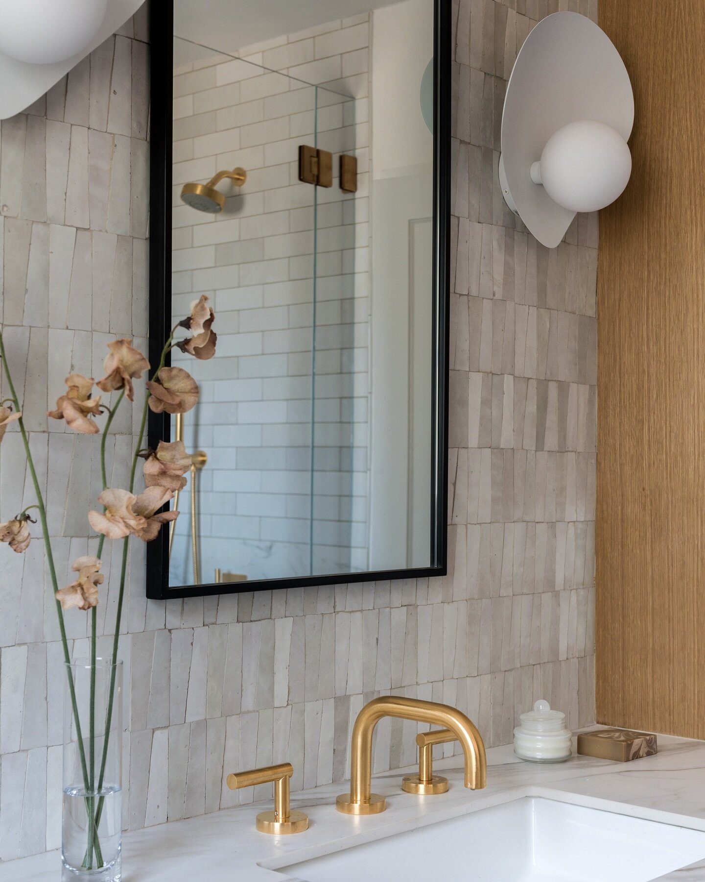 This bathroom deserved to have a moment ✨ Zellige, brass, and the most gorgeous sconces did just the thing! 

Project #StayInLanterman
📷 @charlotteleaphotography 
.
.
.
#StayInteriors #BathroomRemodel #BathroomDesign #Zellige #SilverLakeInteriorDesi