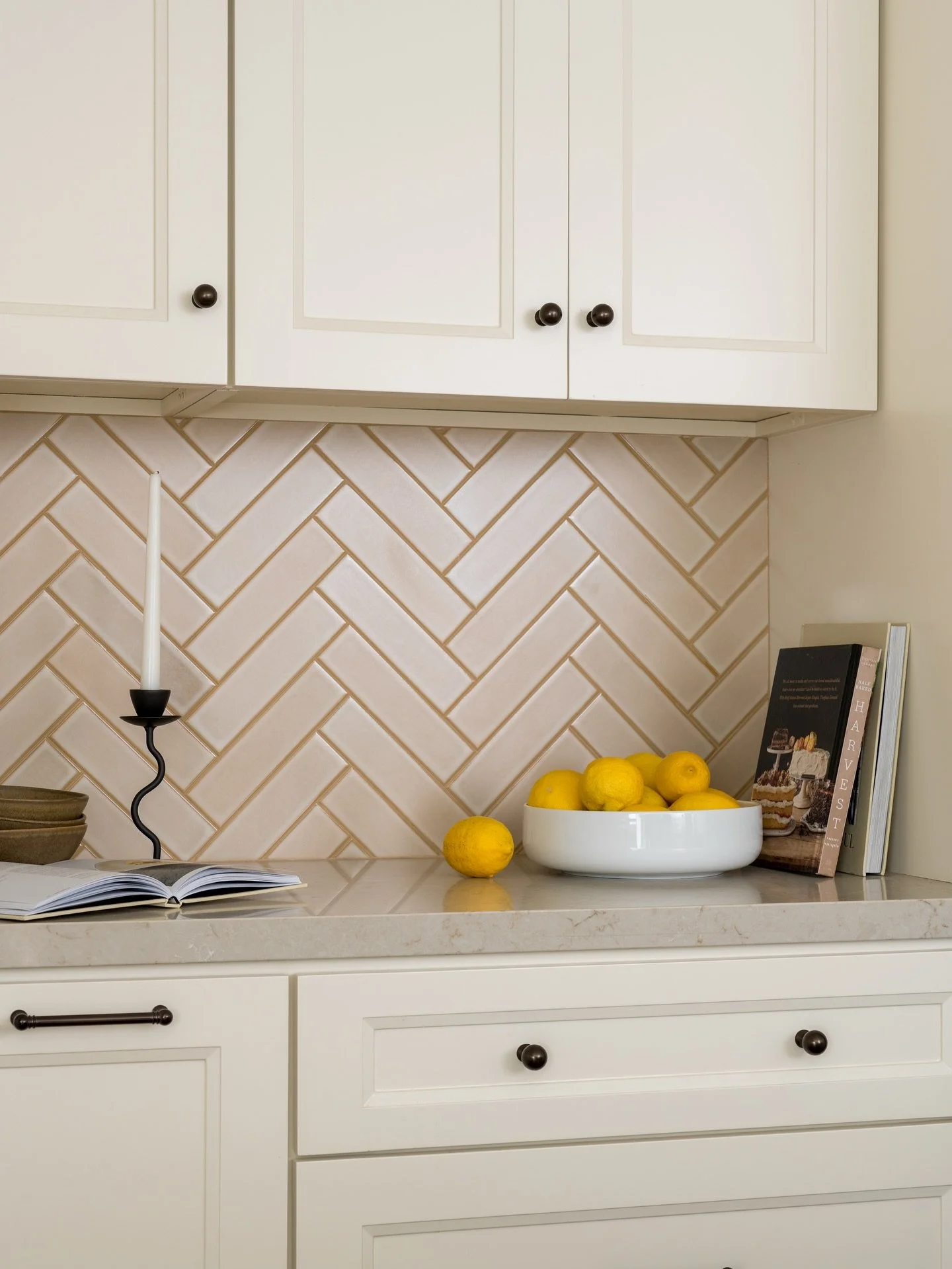 A warm, gentle cream color that instantly gives the kitchen a refined and welcoming feeling, and serves as the perfect neutral to the green island. 

Project #StayIn7Greens
Design/Styling @stayinteriors_la 
Photo @charlotteleaphotography 
.
.
.
#stay