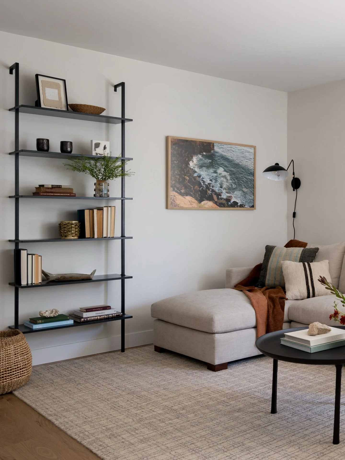 A study in balance // A neutral sofa and rug for calm, an ocean moment on the walls for depth, and a vintage drop-down secretary adding character. Finished with fresh florals in sunset tones to warm up a neutral foundation. 

Project #StayInWestchest