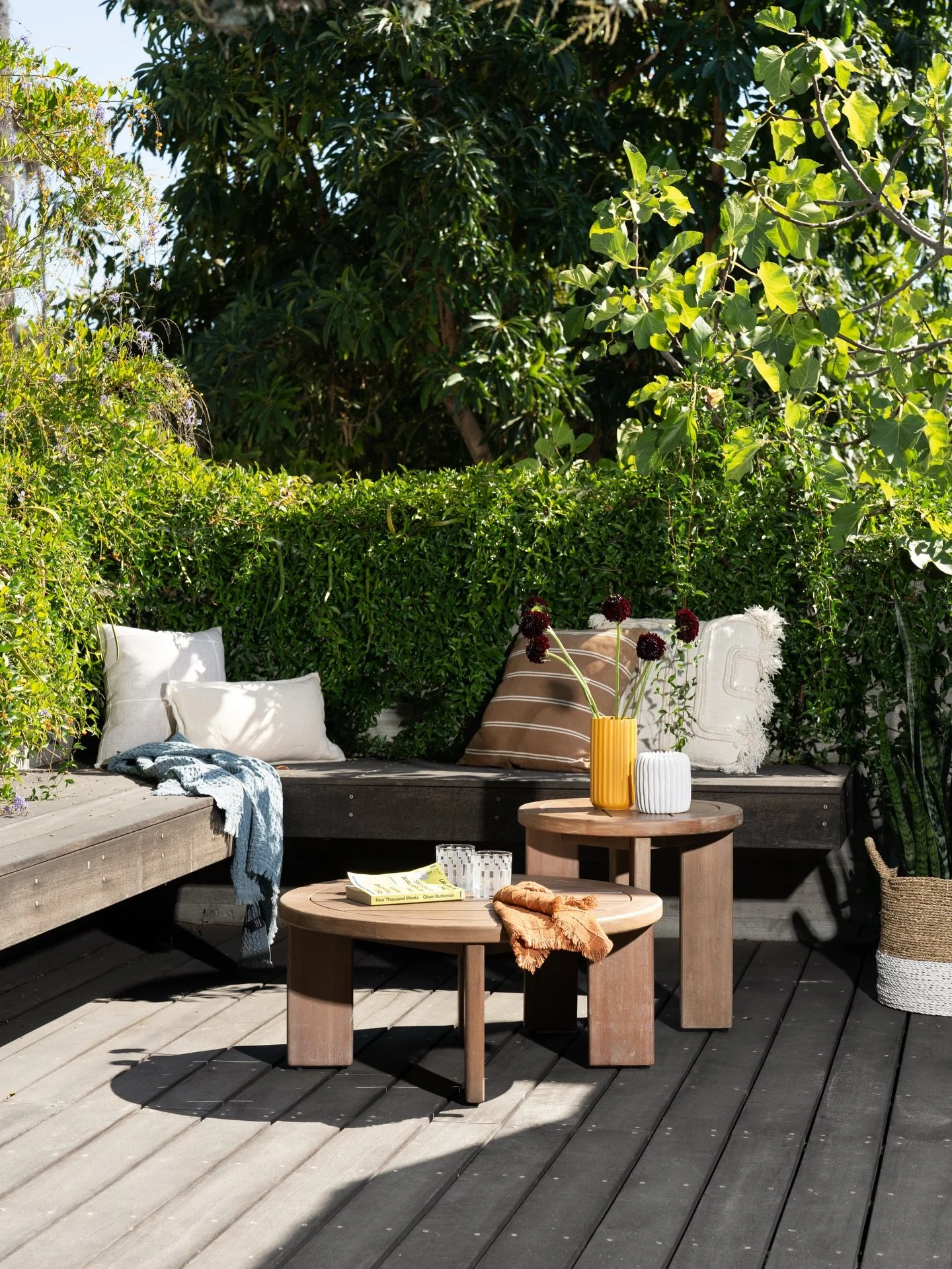 Designing an outdoor space is all about creating a place that feels just as intentional as your interiors. This patio is now a perfect spot to enjoy a coffee in the morning or a glass of wine in the evening! Plus with all that lush greenery, it feels
