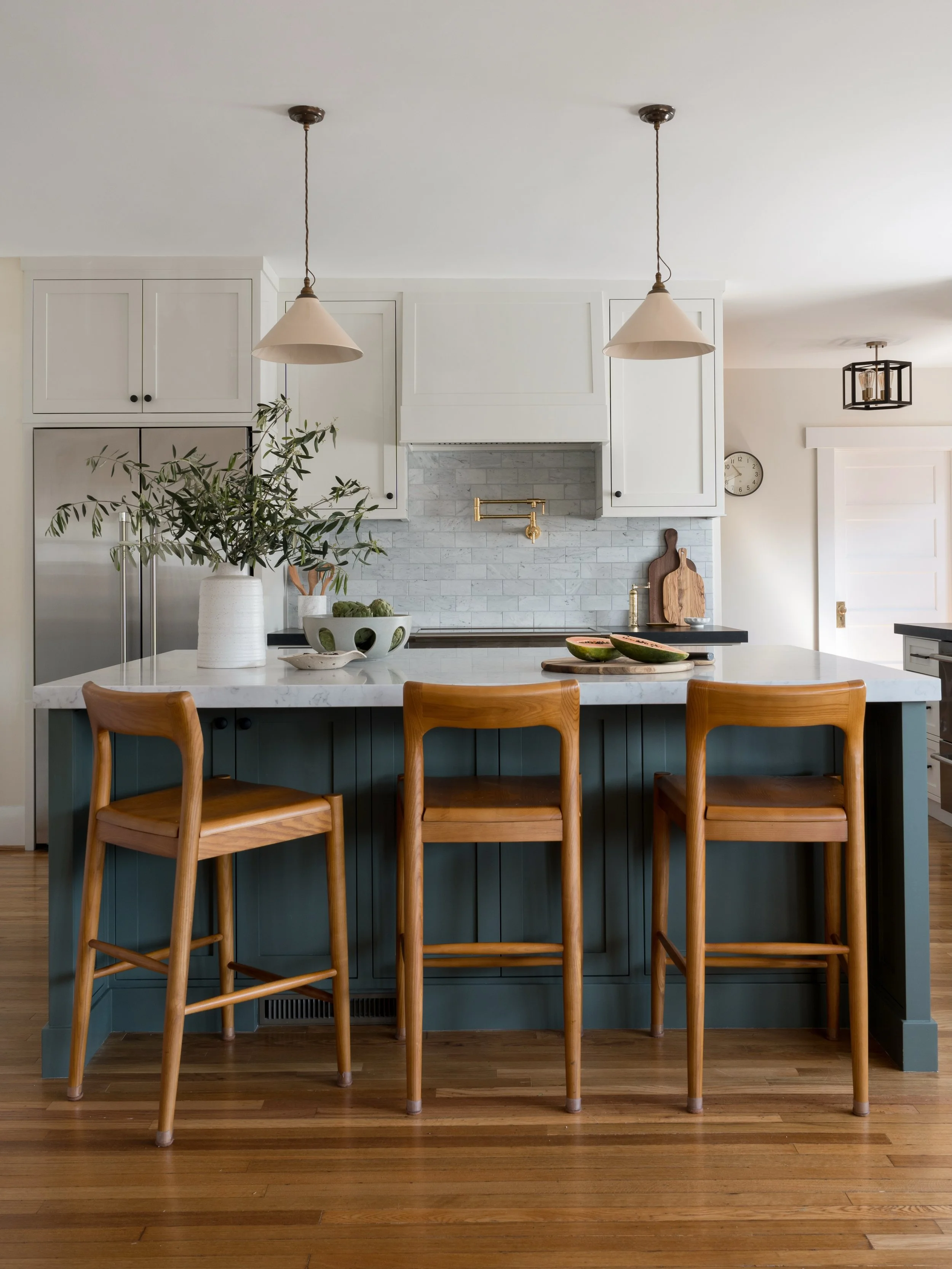 We not only made this kitchen more functional but also brought the charm back with custom inset Shaker cabinets, Carrara marble backsplash, and unlacquered brass plumbing fixtures or taps as my British clients would say! 

Project #StayInDouglas
Desi