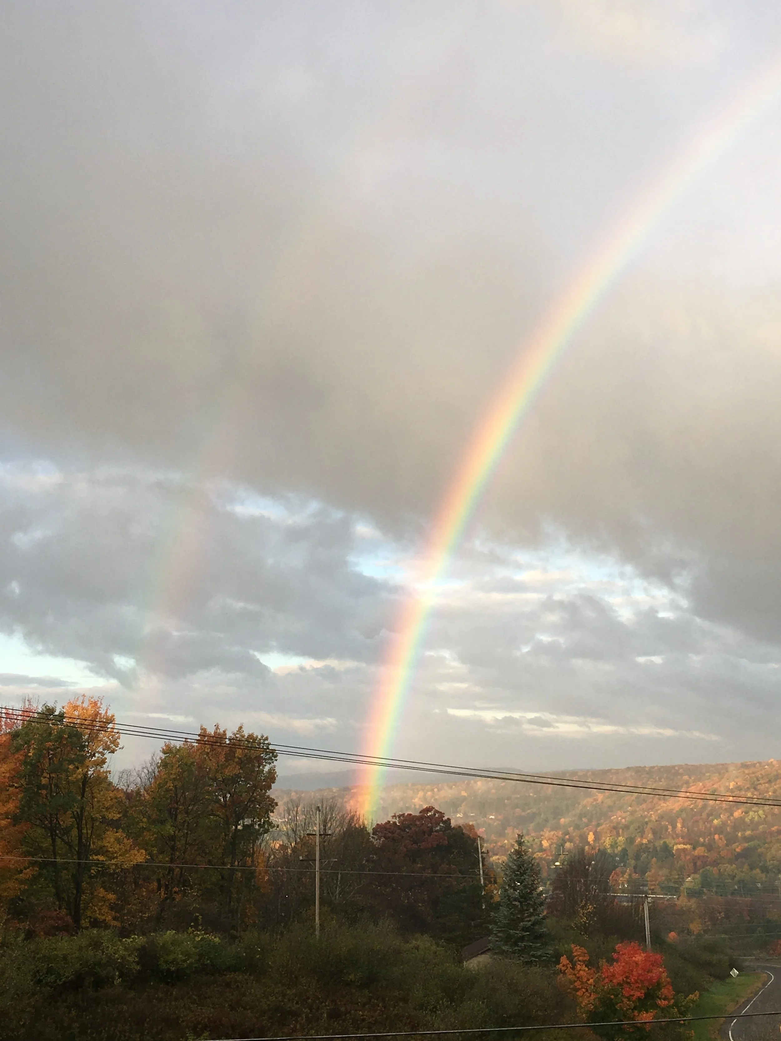 A good sign for our first day in the new office- double rainbow in our new view!
