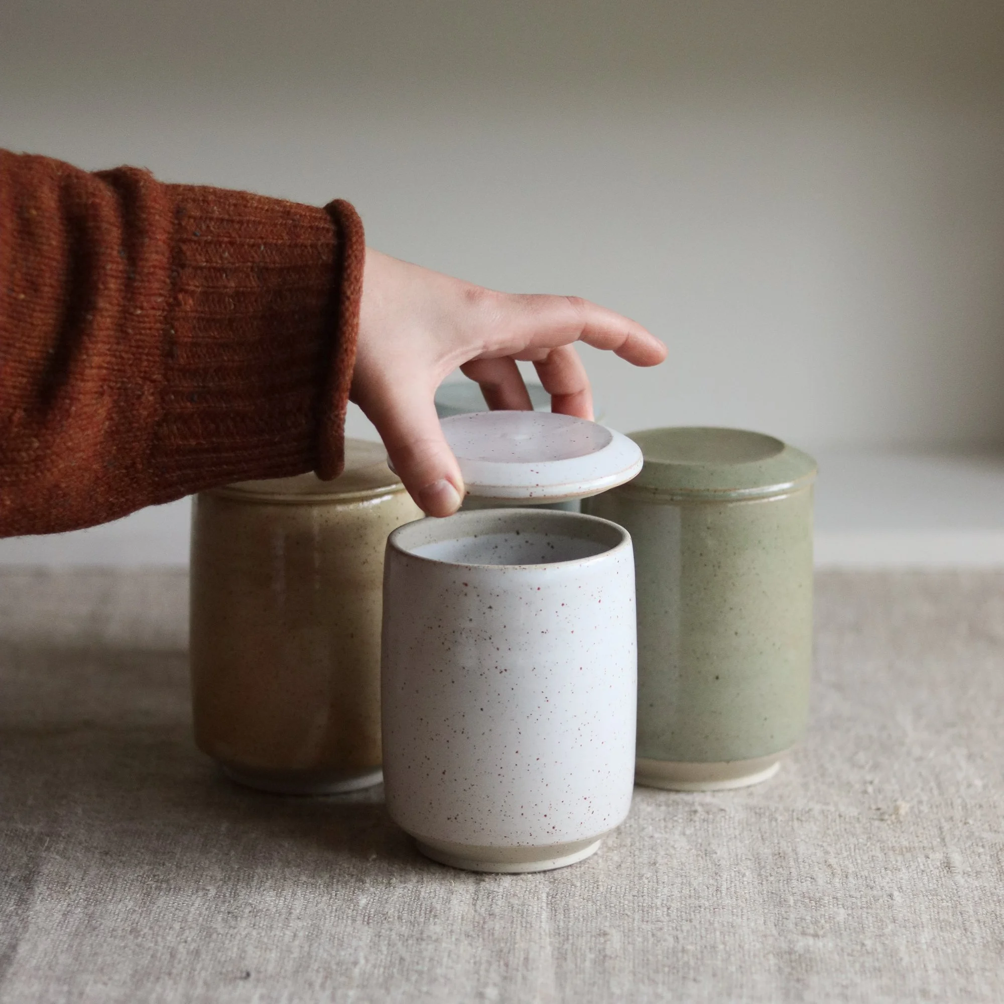 Tall lidded jar, hand thrown at the potter's wheel in Yorkshire