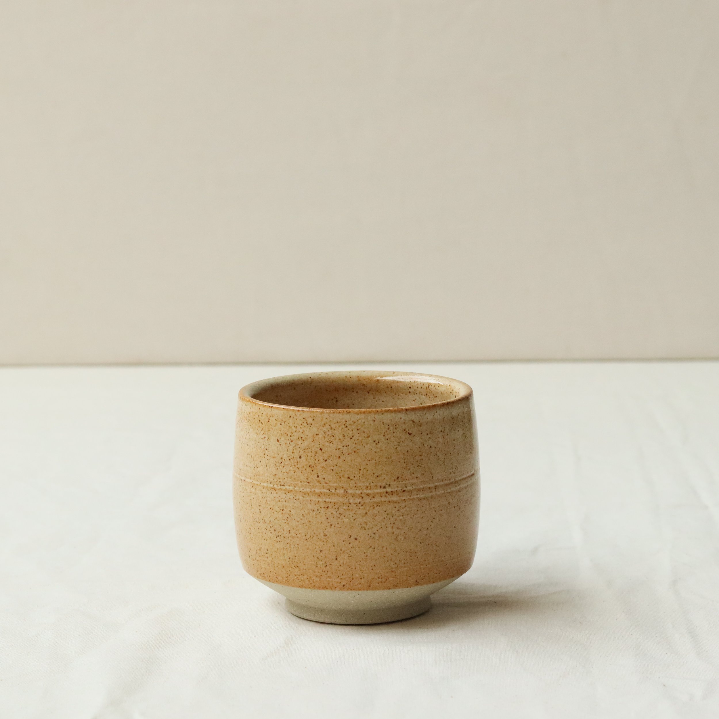 Tea Bowl in Sand, Flecked Stoneware.jpg
