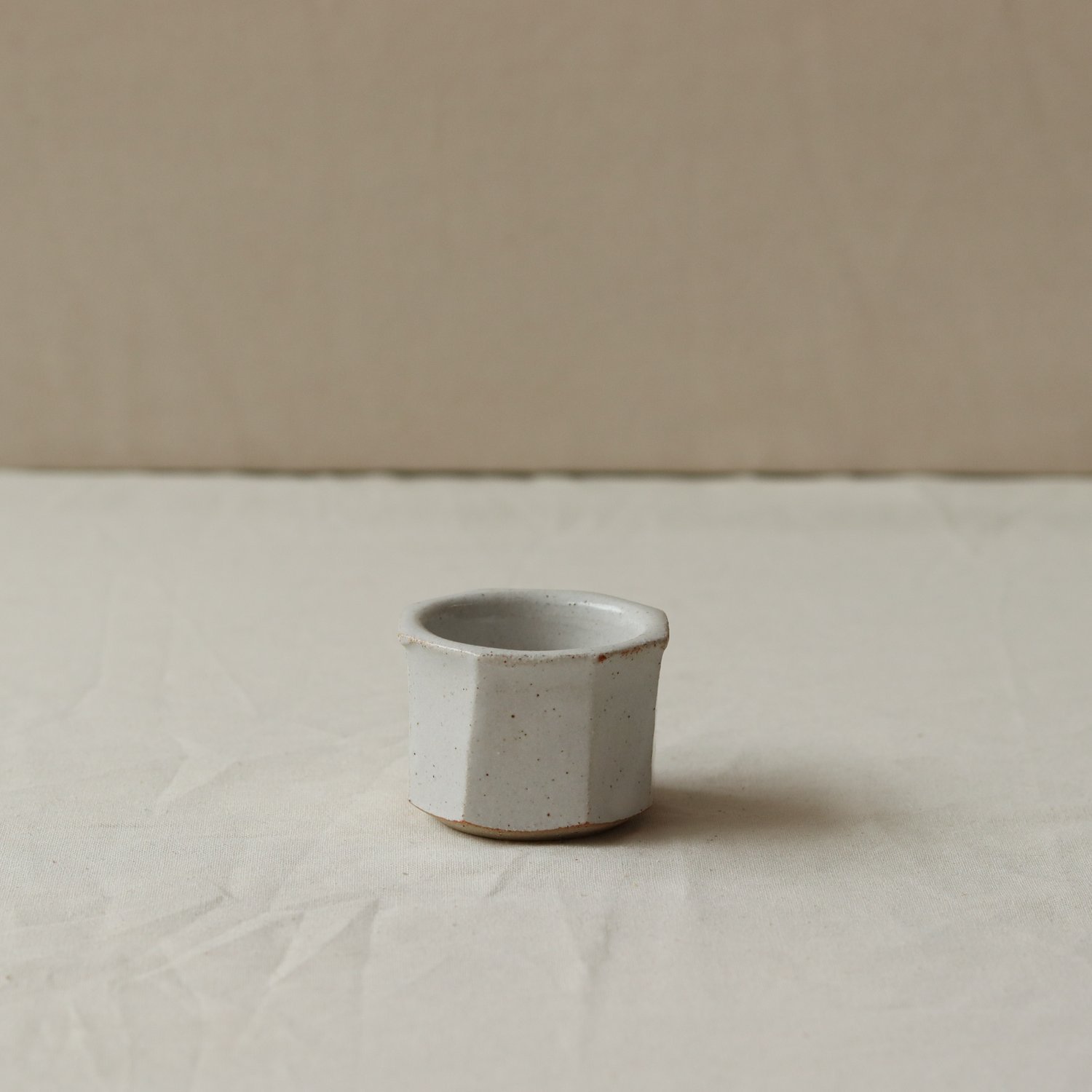 Faceted+Egg+Cup+in+Tin+White+Flecked+Stoneware-3.jpeg