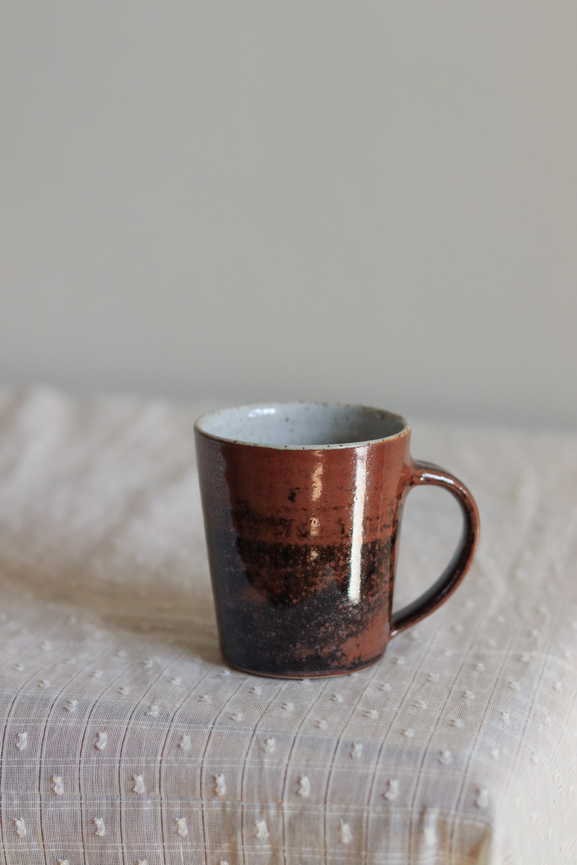 12_Tapered Mug in Tenmoku Chun-2.jpg