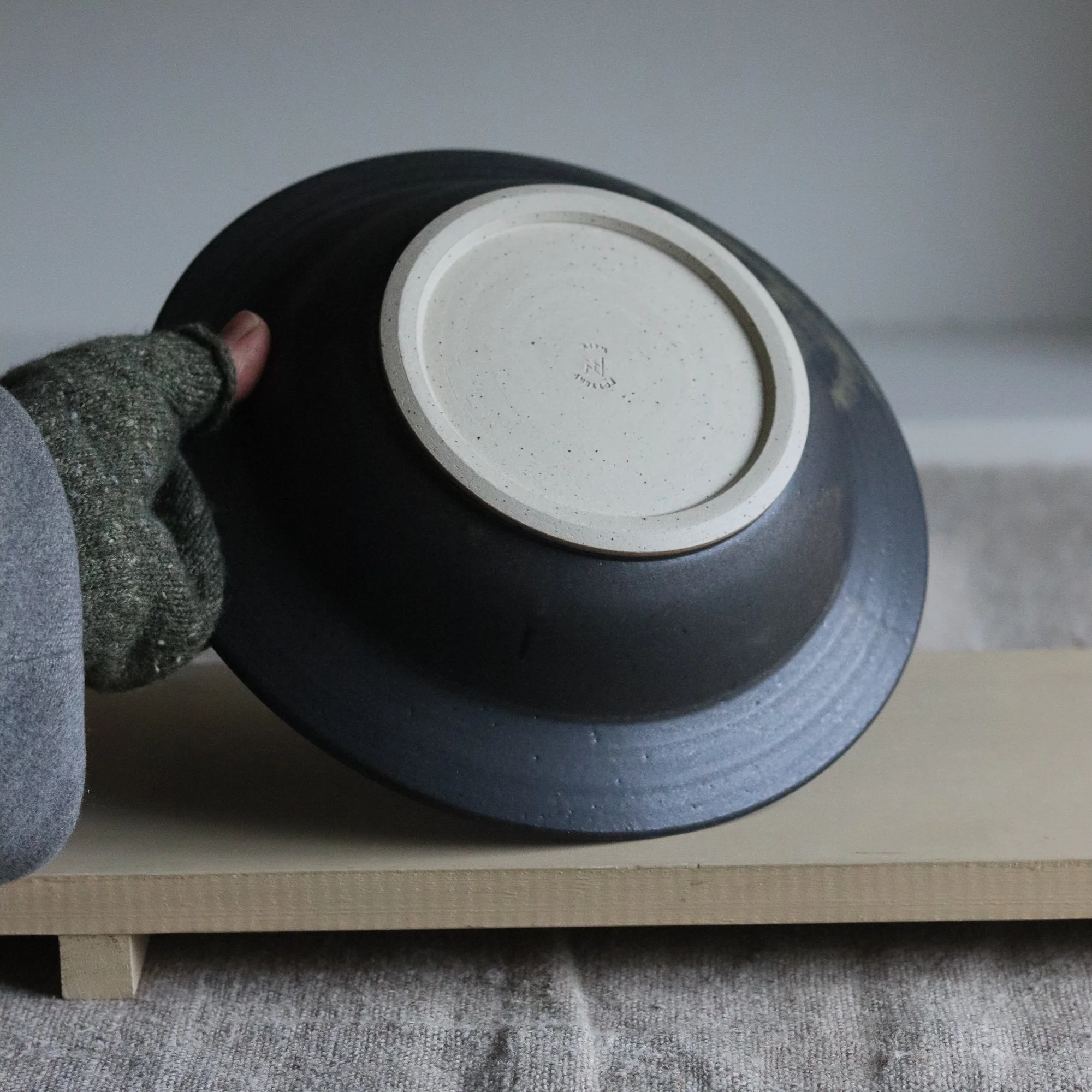 Stoneware lipped dinner bowl in charcoal by Pottery West