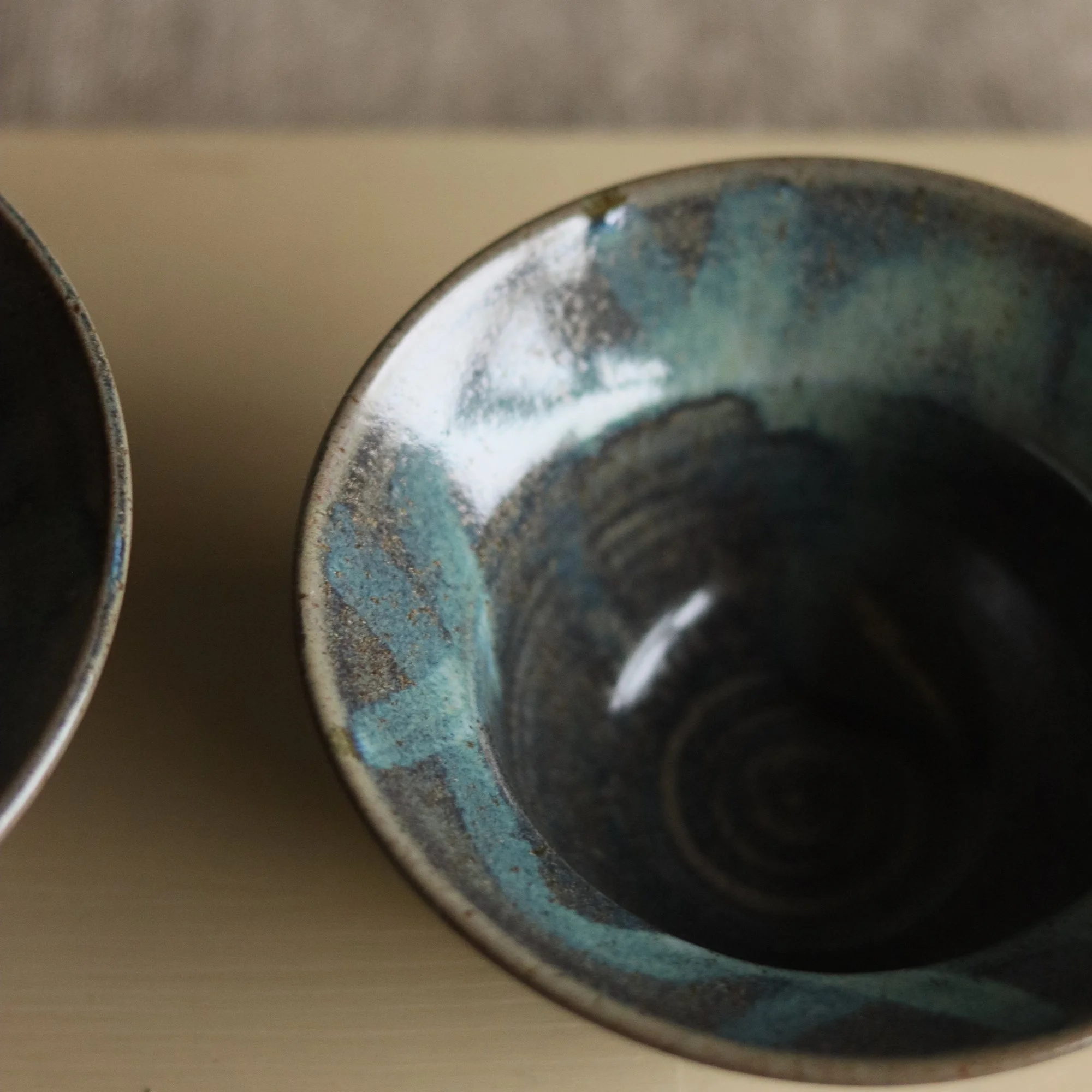 Stoneware hand thrown dark blue green bowl by Pottery West