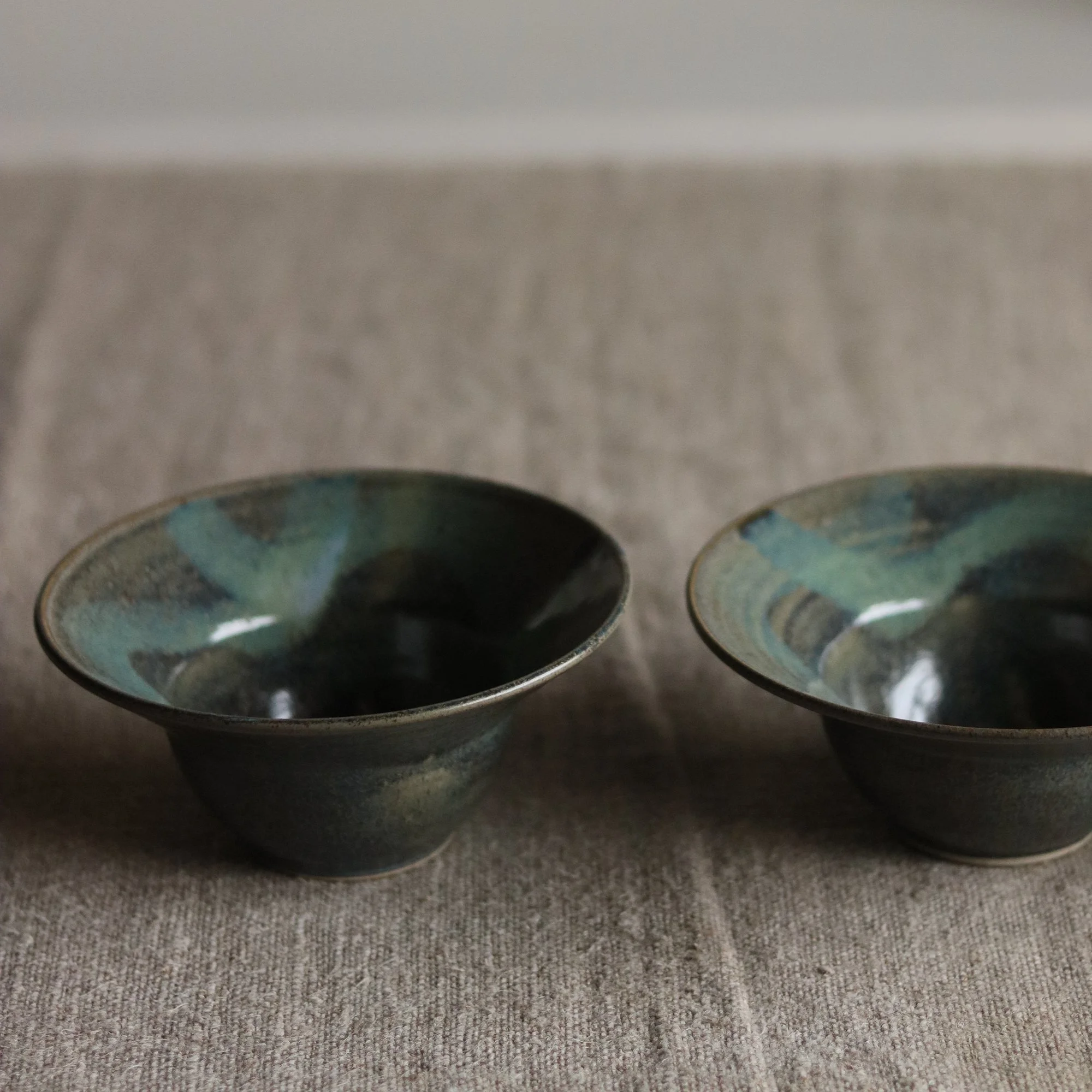 Deep blue nori glaze with brushwork on a flecked stoneware hand thrown bowl, by Pottery West