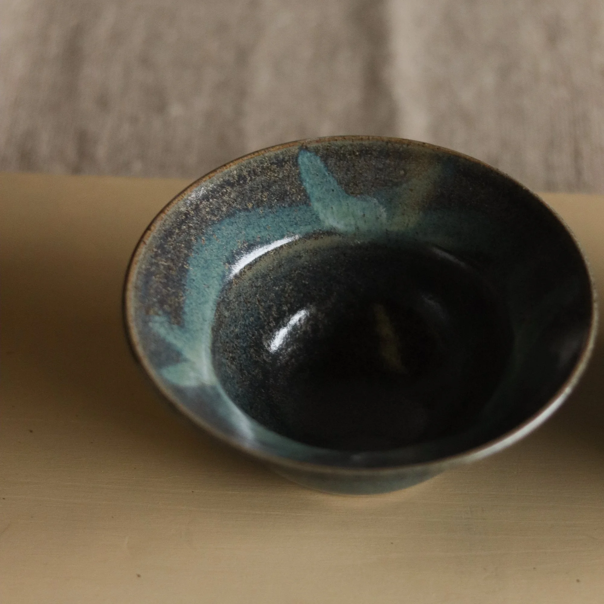 Stoneware hand thrown dark blue green bowl by Pottery West