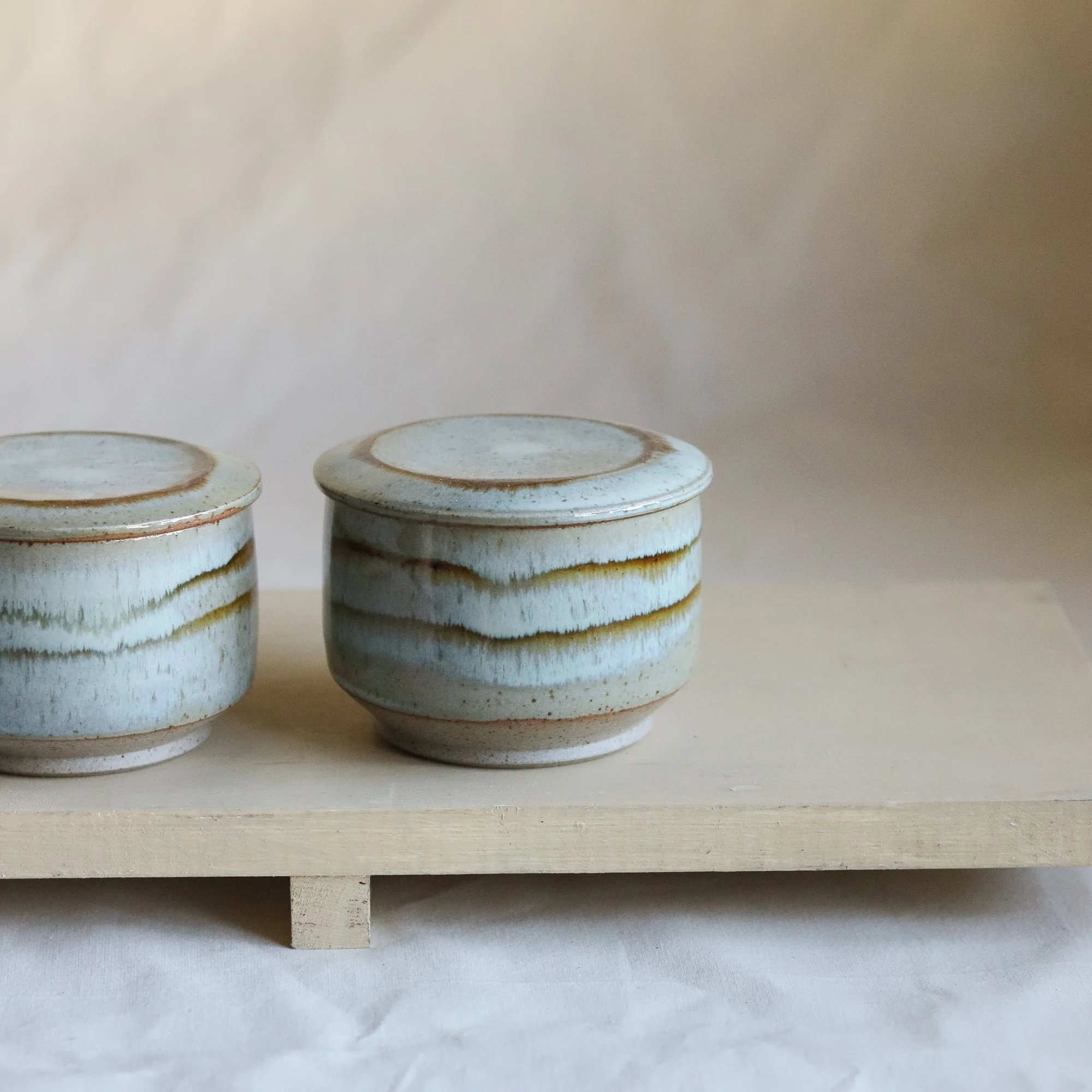 Small Lidded Jar in Pale Blue Chun with Iron Brushwork