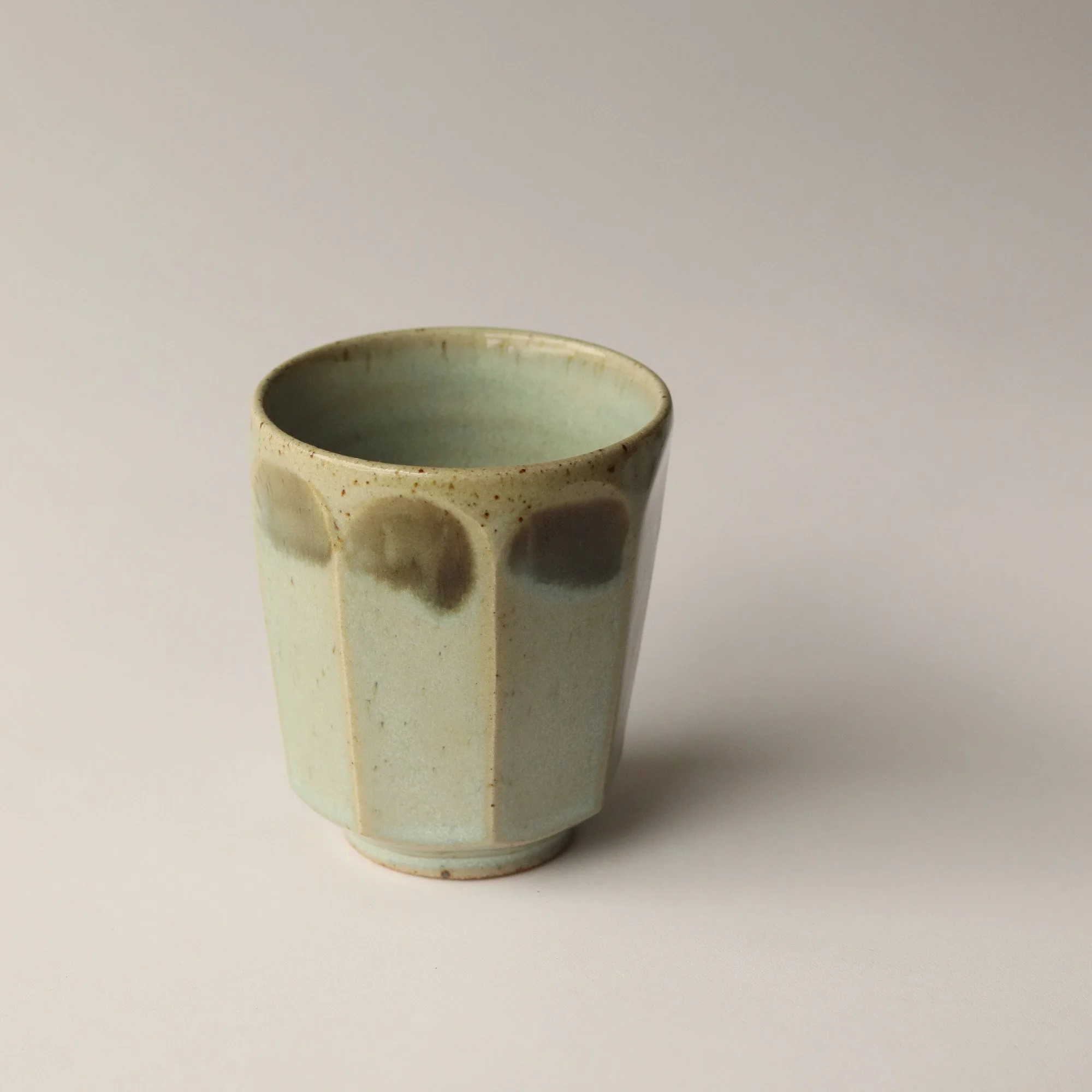 faceted beaker pbc tenmoku.jpg