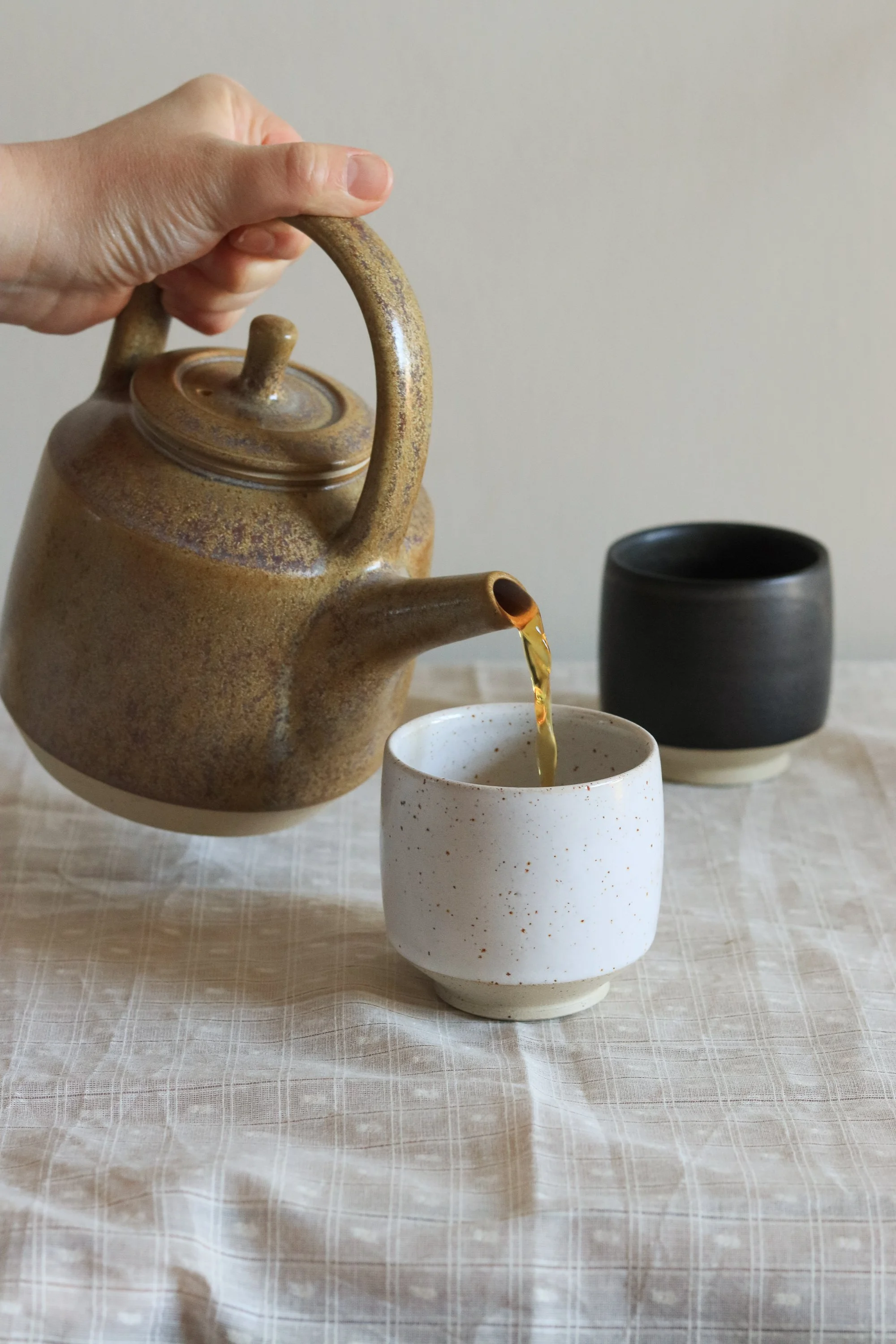Hand thrown teapot in ochre, flecked stoneware by Pottery West