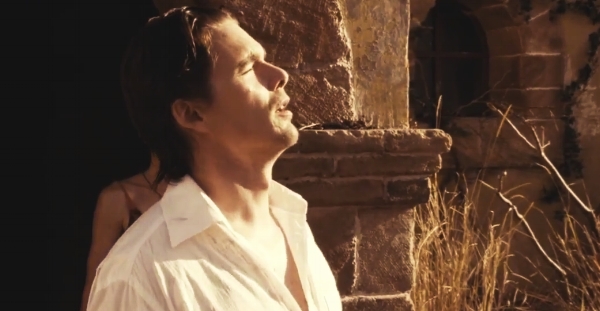 Bathed in light, wearing white, looking just like the Son of God.