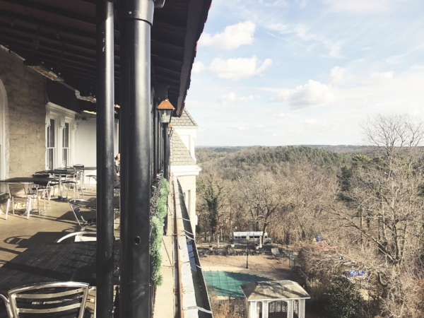The patio off of Dr. Baker's Lounge includes an impressive view of the Ozark mountains, which is what first inspired architects to build on this site.