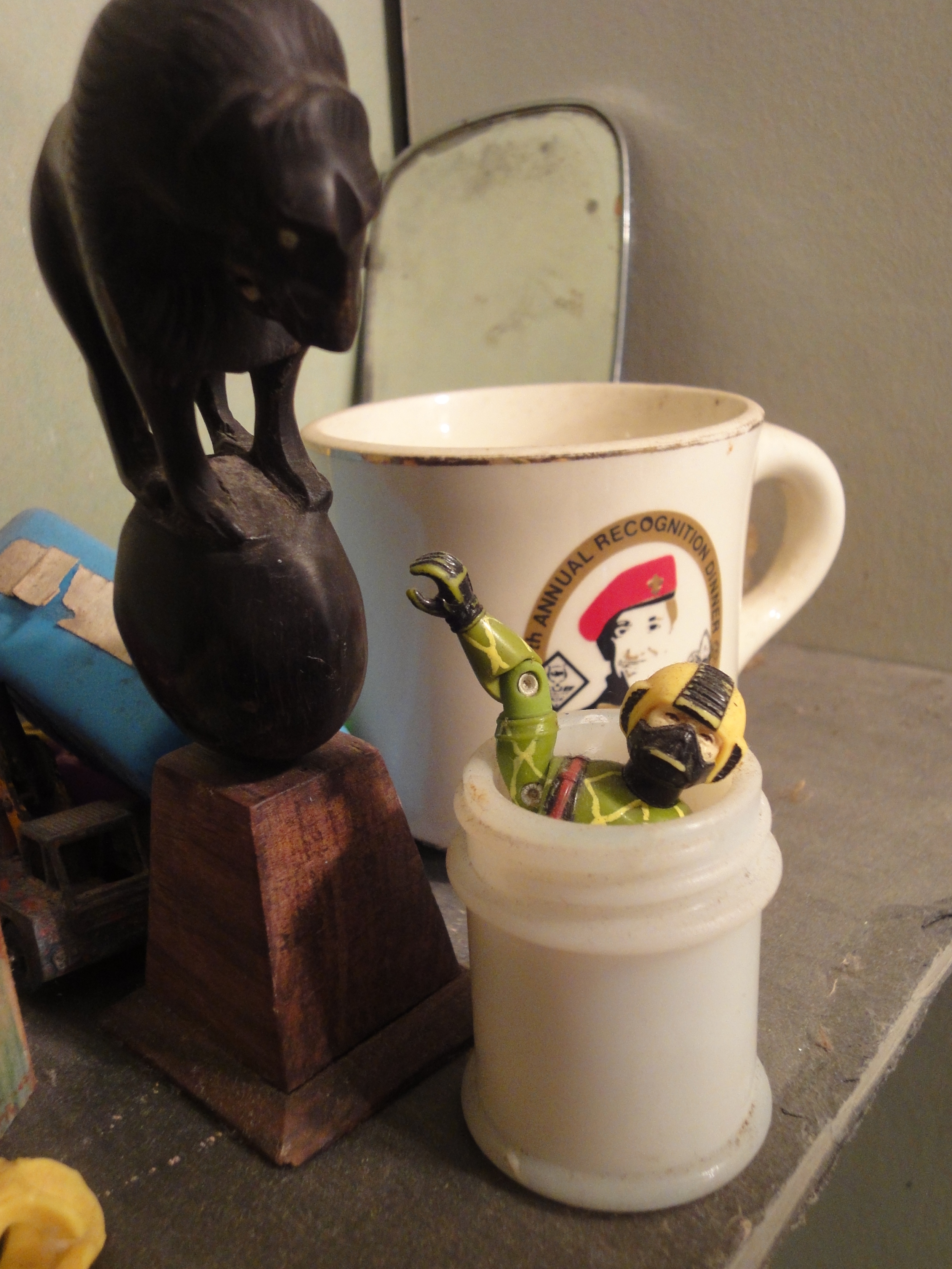   Jeff just collects all kinds of discarded and broken things that have a beauty to them, but are also often a little strange too --&nbsp;a GI Joe action figure missing an arm and his legs reaching out of an old porcelain container, a rusting bathtub