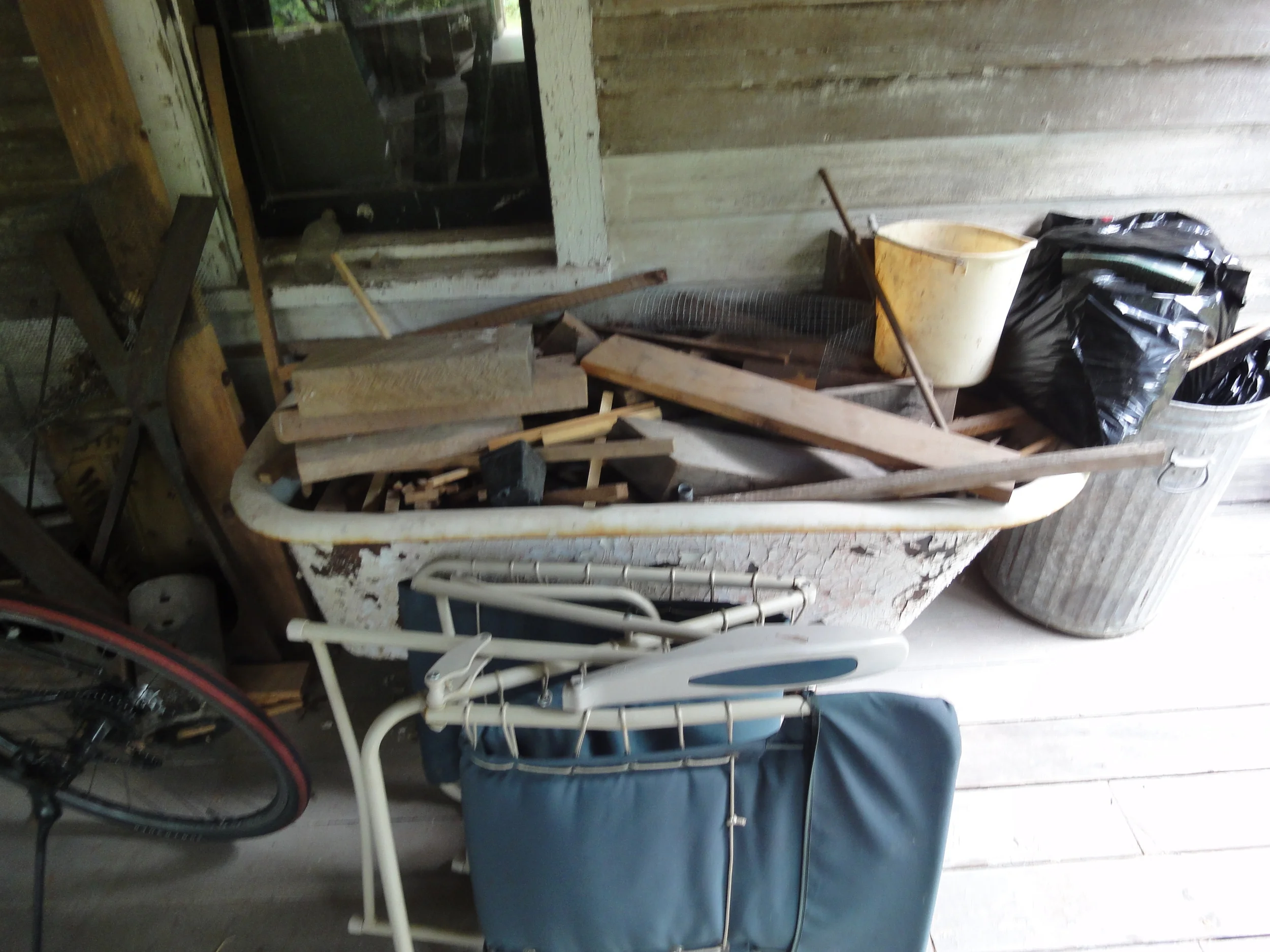  A porcupine lived in the basement for a time. &nbsp;Wasps and bats lived overhead in the ceiling space. &nbsp;Moths fluttered around hanging caged construction lamps.&nbsp;&nbsp; The place was so overrun with non-human life that the I often felt tha