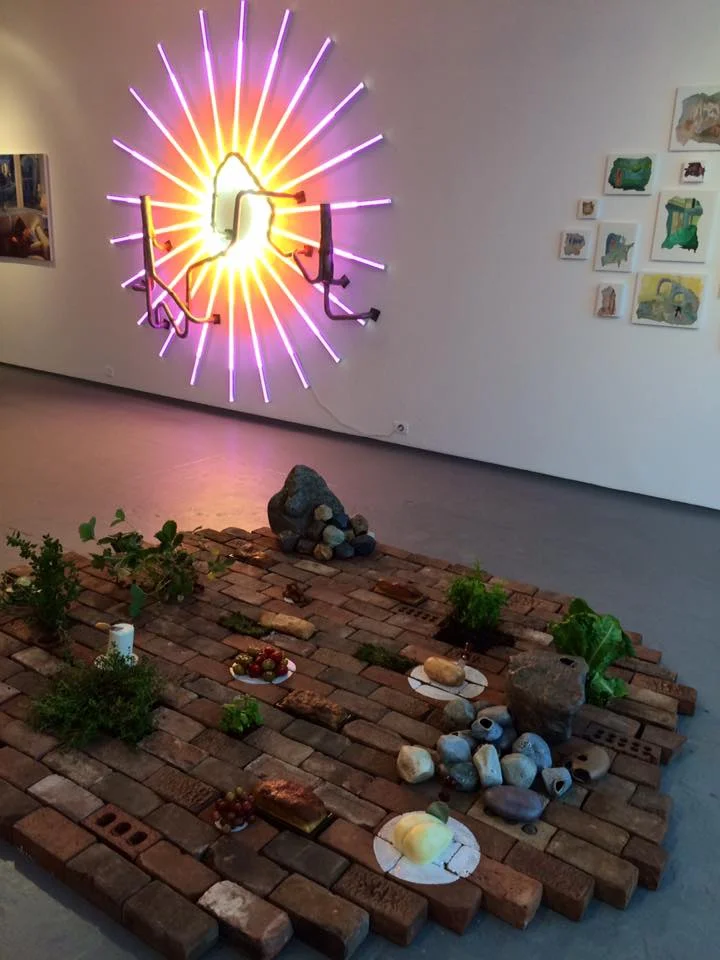 Artist John Spano displayed his light piece, The Everglow 10/24/24 , 2016. notthatjohnspano.com Artist Ruth Borgenicht's interactive floor piece, Eat Where You Walk/Walk Where You Eat , 2016. ruthborgenicht.com