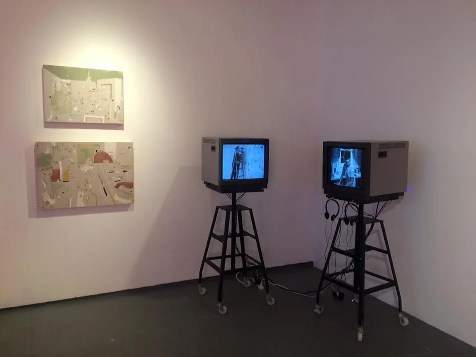 My work exhibited from top left to right: 4350 29th Avenue: Cooking Thanksgiving Dinner, 2016. House paint, wood glue, joint compound, stain, graphite, and cuts on drywall. 21.75"x30." 173 Parker Farms Road: In the Kitchen , 2016. House paint, wood glue, joint compound, graphite, charcoal, and cuts on drywall. 17.5"x24." Construction and Maintenance , 2016. Two channel video on CRT monitors and workshop stands. 58"x17.5"x18.5."