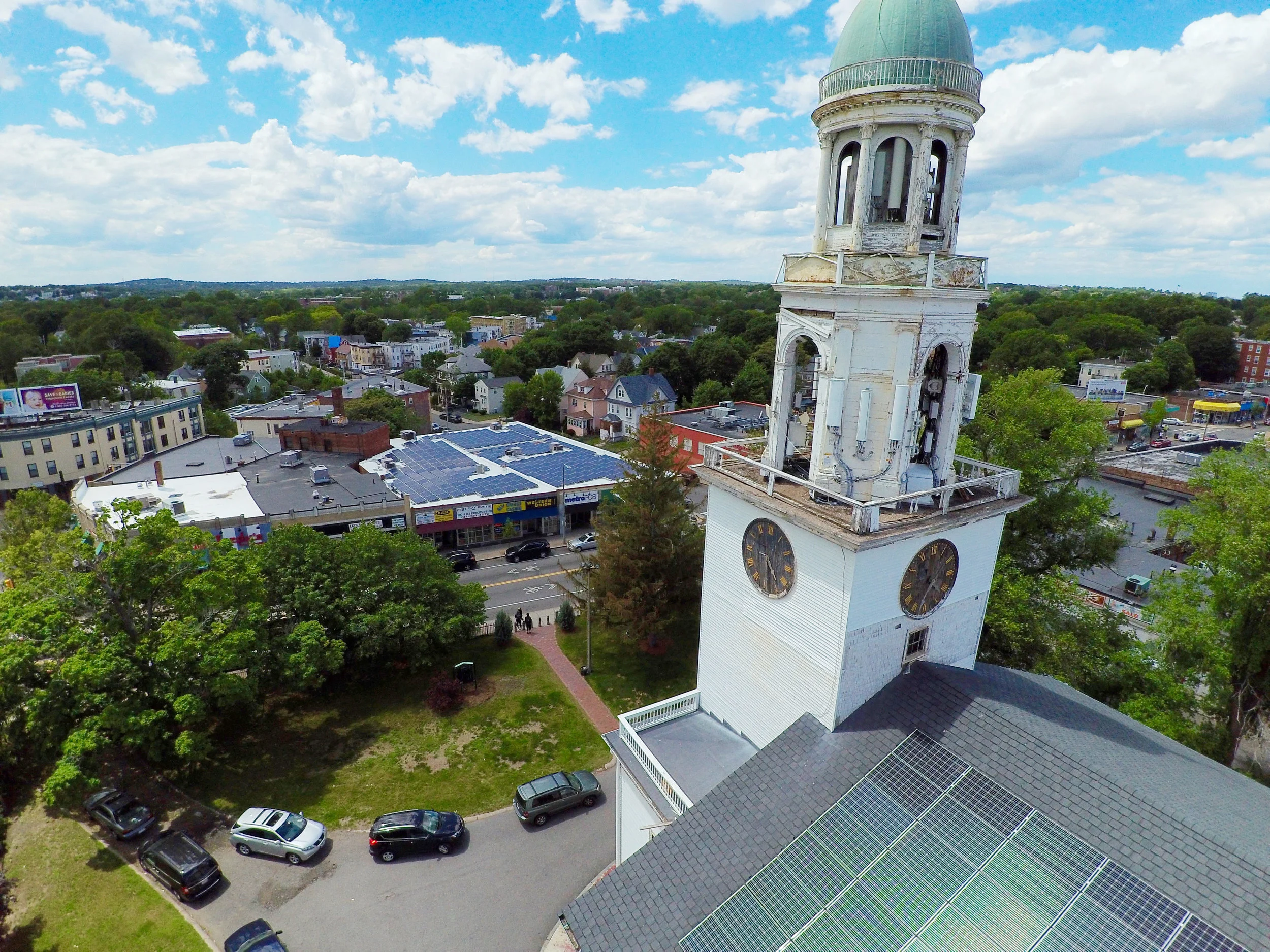 Second Church in Dorchester Through the Codman Square Goes Solar initiative, Second Church in Dorchester installed a 25-kilowatt system on the roof. “It was an exciting time for us when we heard that we can have solar on our roof that provides a portion of the electricity for our building,” recalls Alphonse Knight, the property manager at Second Church. “We are smiling to the bank for saving a lot of money. It’s catching on in the neighborhood… Solar is here to stay and we want to work with it.” The project provides a means for Second Church to lead by example and be a steward in faith and environmental leadership. In 2017, Mayor Walsh awarded the 211-year-old building the Buildings and Energy Greenovate award .
