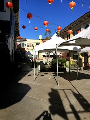 TENTING UP THE PLAZA FOR THE A.G. GEIGER ANNUAL OCTOBER BOOK FAIR . INFO: AGGEIGER.COM/BOOKFAIR