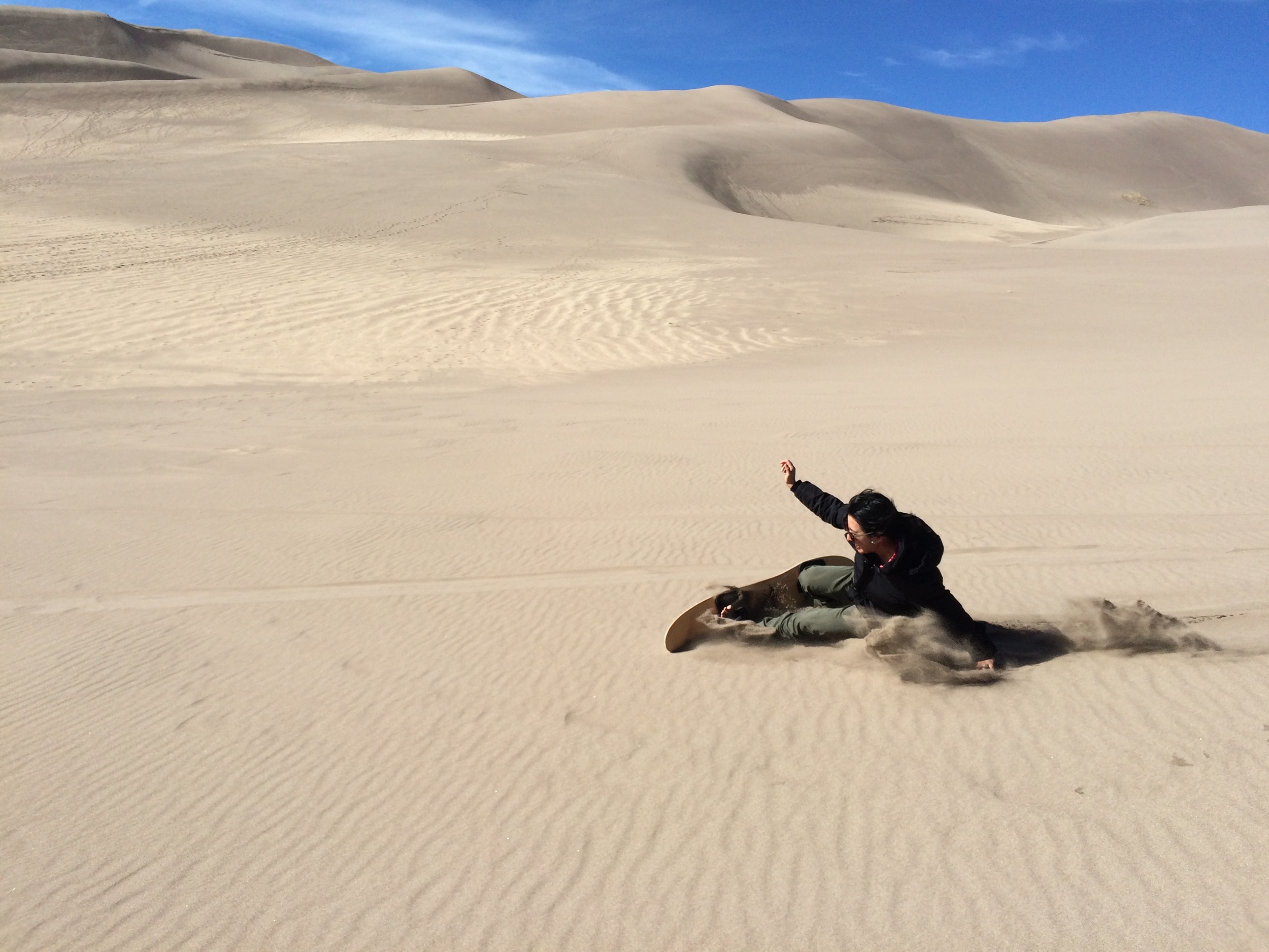 Theresa Sliding across the sand