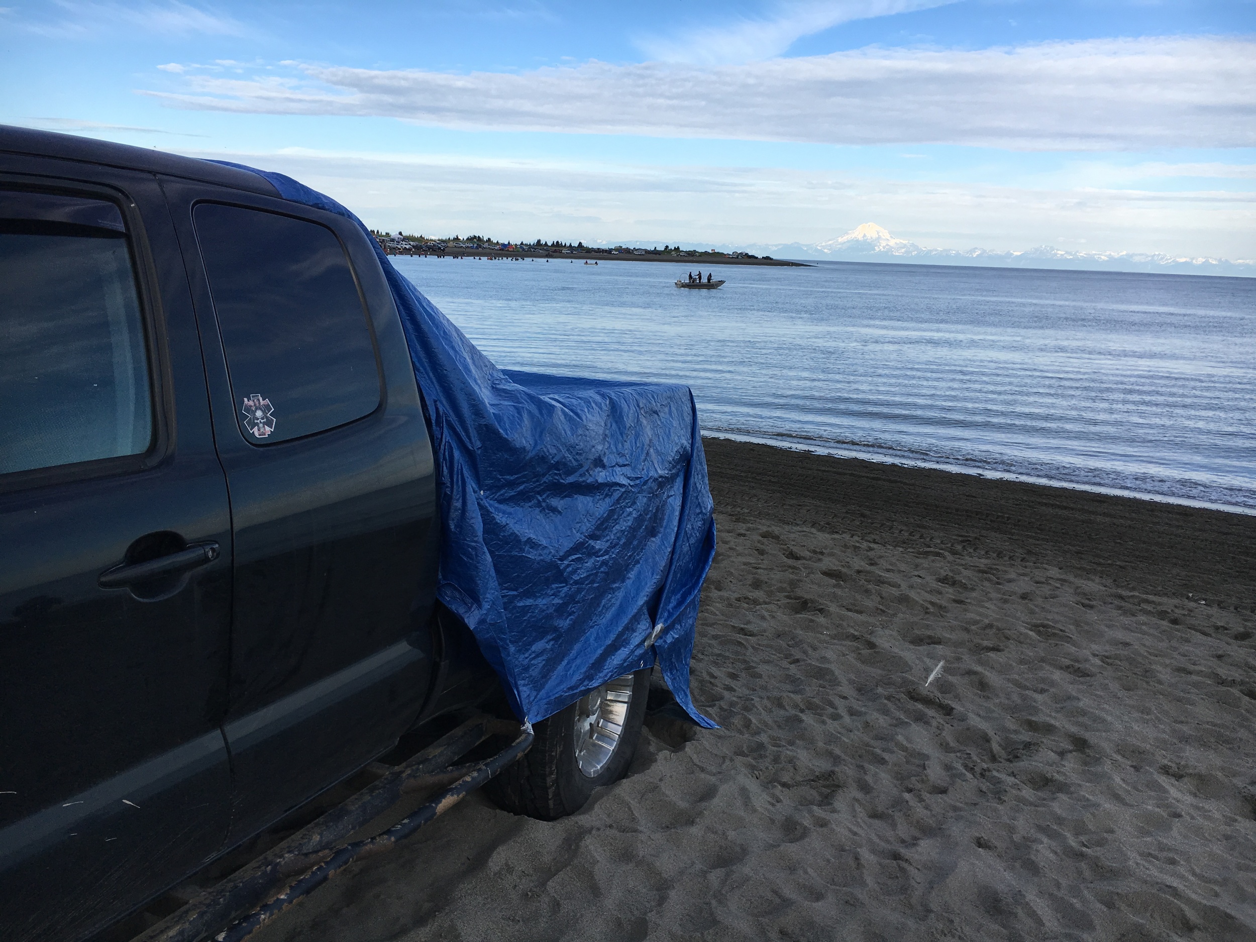 I used the door to help secure the tarp too. 