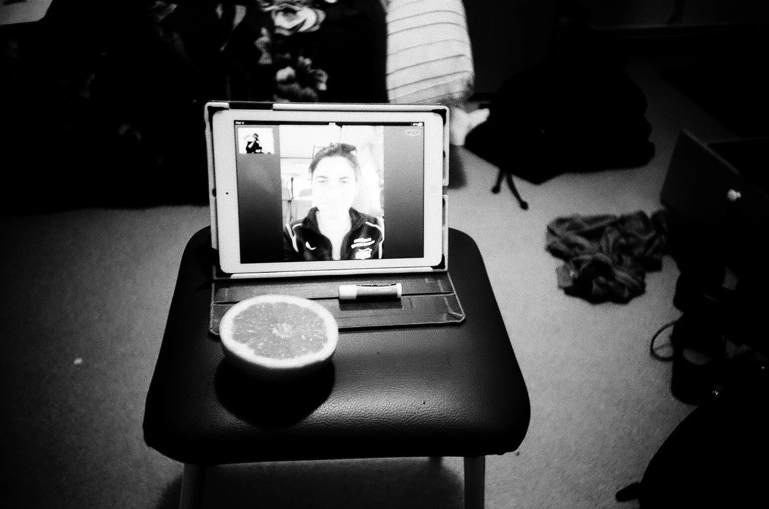 It can take as much planning to bring two people together on screen as it does to get thirty to a train stop near Moscow in March. I had to capture the exchange, especially since you were in a parked car, in Iowa no less, and I’ve never been to Iowa nor you to Novosibirsk. If your government stipend paid for your groceries, did they look inside your bag? If mine bought me that grapefruit, do they get to see me eat it? We weren’t exactly talking in private. I don’t know how to escape the authorities on that screen with you. It’s been so long since we’ve met at a train stop or on any other platform.
