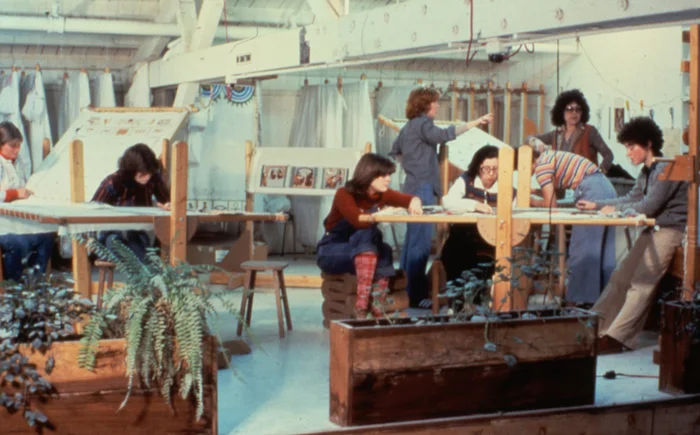 Fig. 2. Judy Chicago and Others Working in The Dinner Party Needlework Loft, 1978. Courtesy of Through the Flower Archive.