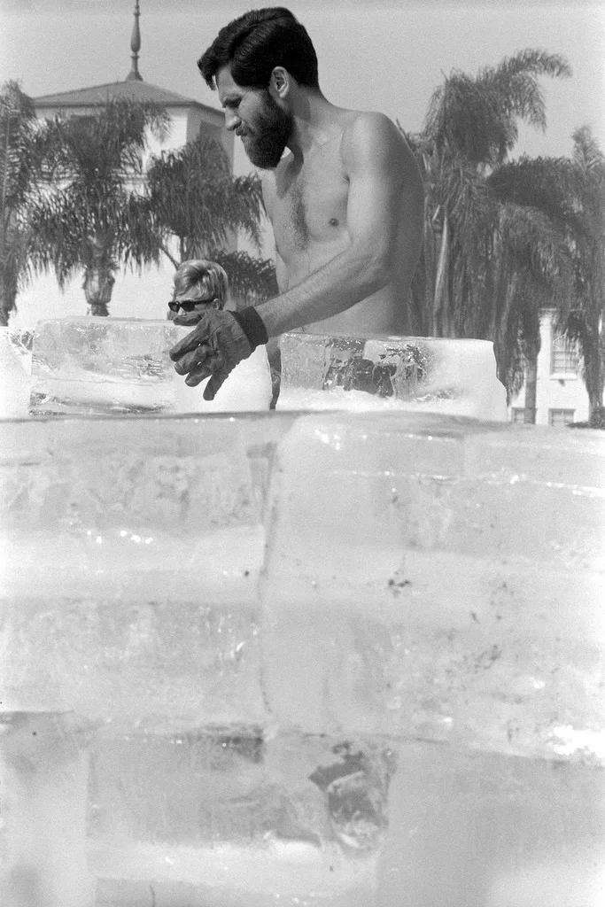 Allan Kaprow placing an ice block during the creation of Fluids (1967). Image from the collection of the Los Angeles County Museum of Art. Photo copyright of Dennis Hopper.