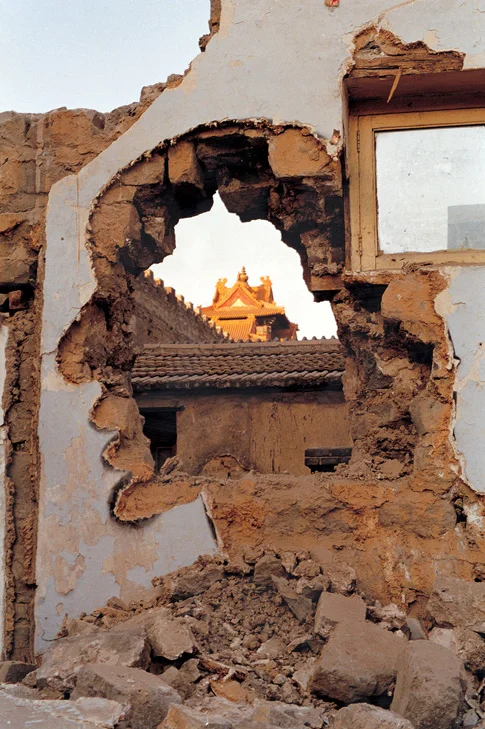 This is an image by the Chinese artist Zhang Dali , who spray-painted his profile -- often as a demolished "cut out" -- across Beijing. The work is strangely provocative. Writing in the journal Visual Studies , Adam Yuet Chau observes that Chinese artists have increasingly used scenes of demolition as part of an emerging iconography of modernity, noting that "demolition is the very basis of capitalistic development."