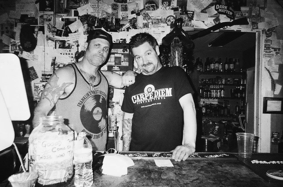 Here we have our owner, Will Jordan, and one of our favorite bartenders and performers, Aaron Paul serving up some cold brews and delicious food. 