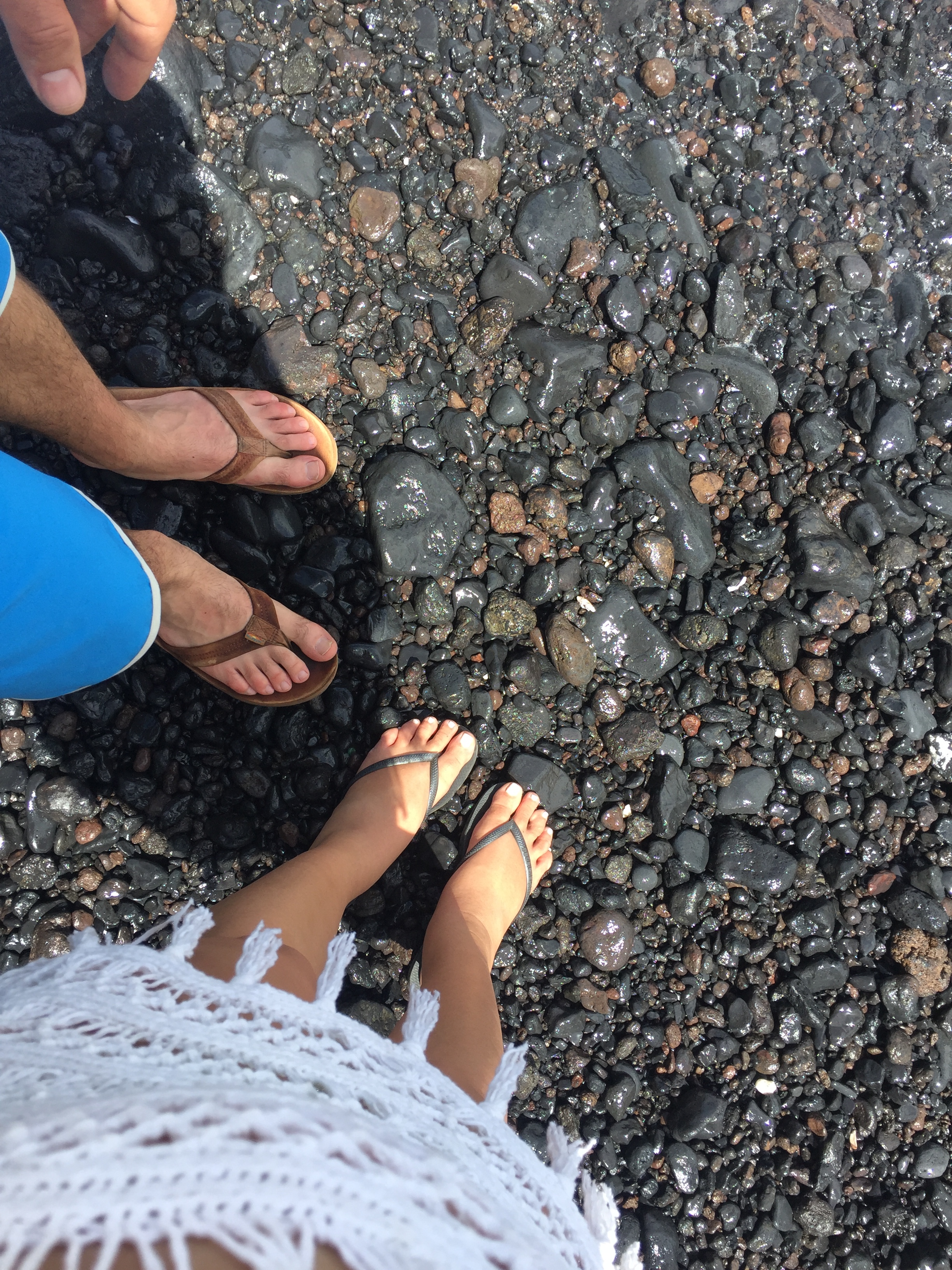 While some of it is black sand, it should probably be called Black Pebble Beach!